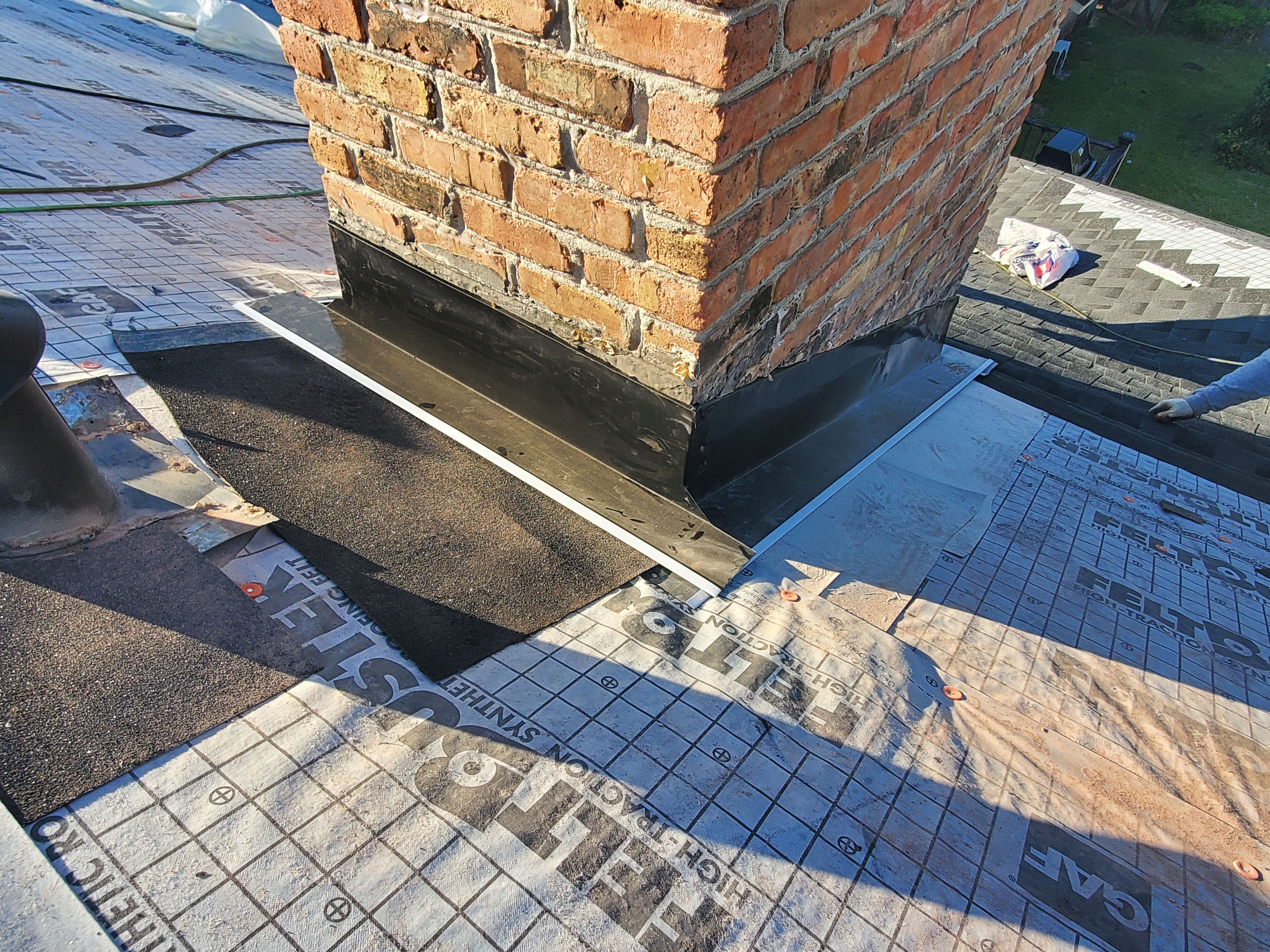 Residential Roofing Installation using Roof Replacement by American Roofing & Construction LLC