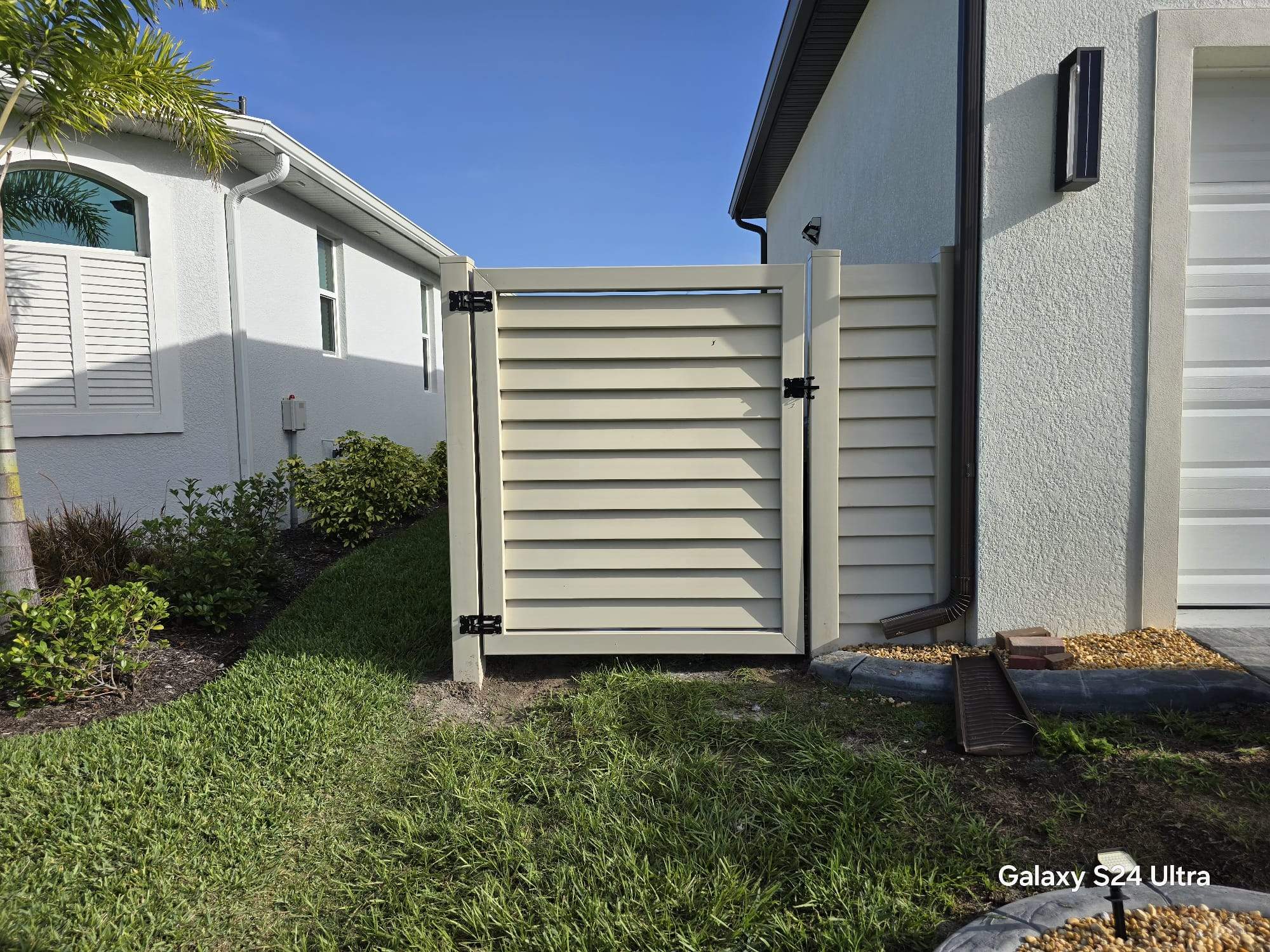 Tan Louvered Vinyl in Port Charlotte by True Fence LLC