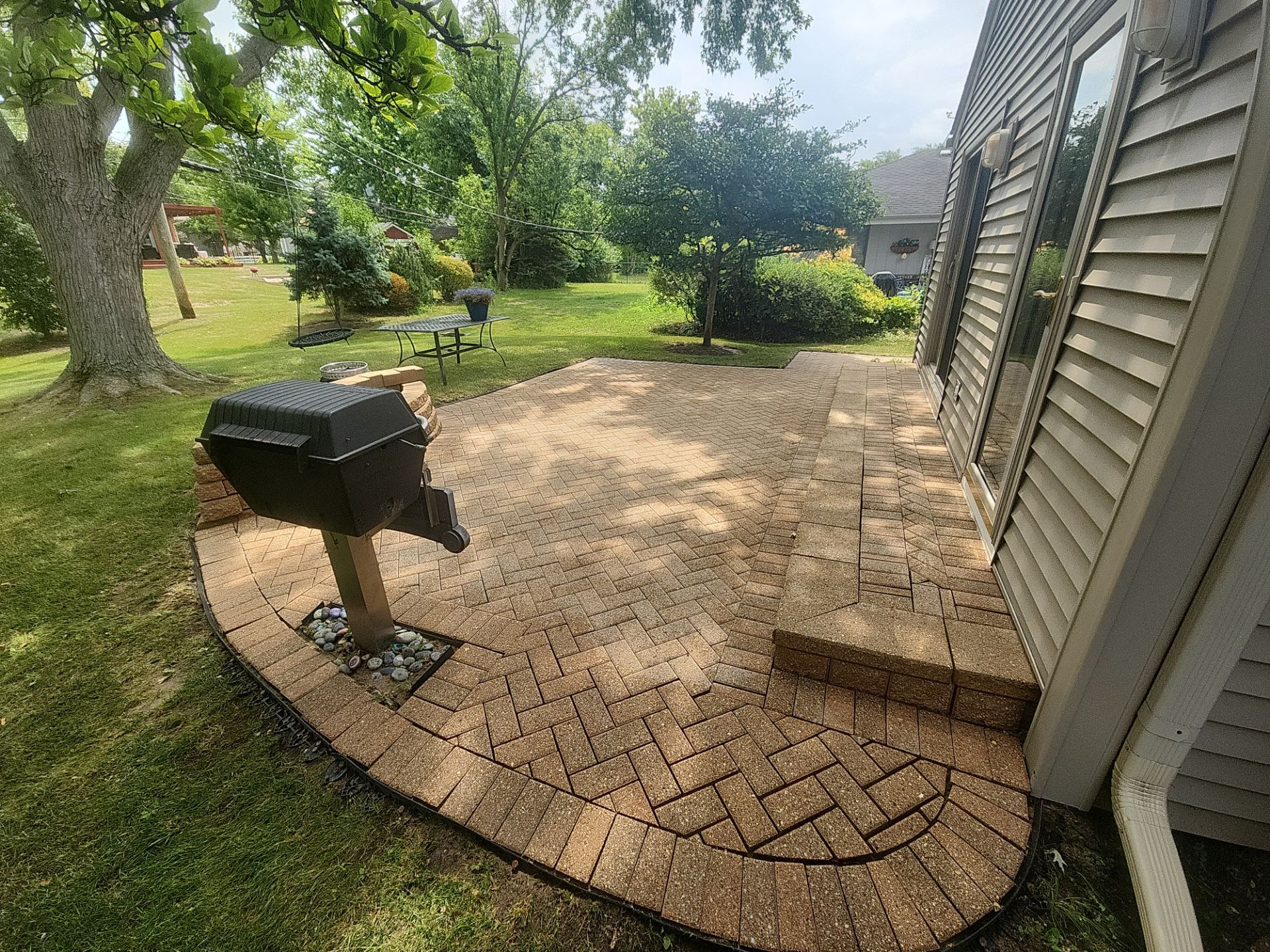 Arlington Heights Brick paver repair, cleaning and sealing by Northern Power Washing LLC.