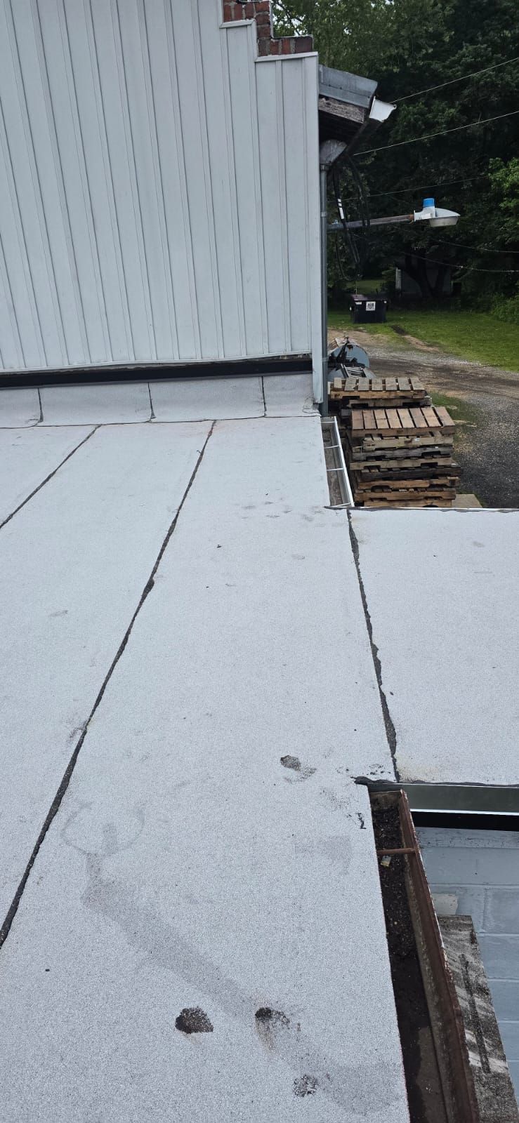 Roof Installation using Silicone APP Elevate Coating by ExteriorPros