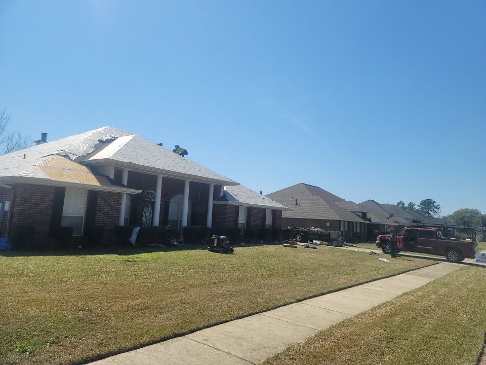 Residential Roofing Installation using Roof Replacement by American Roofing & Construction LLC