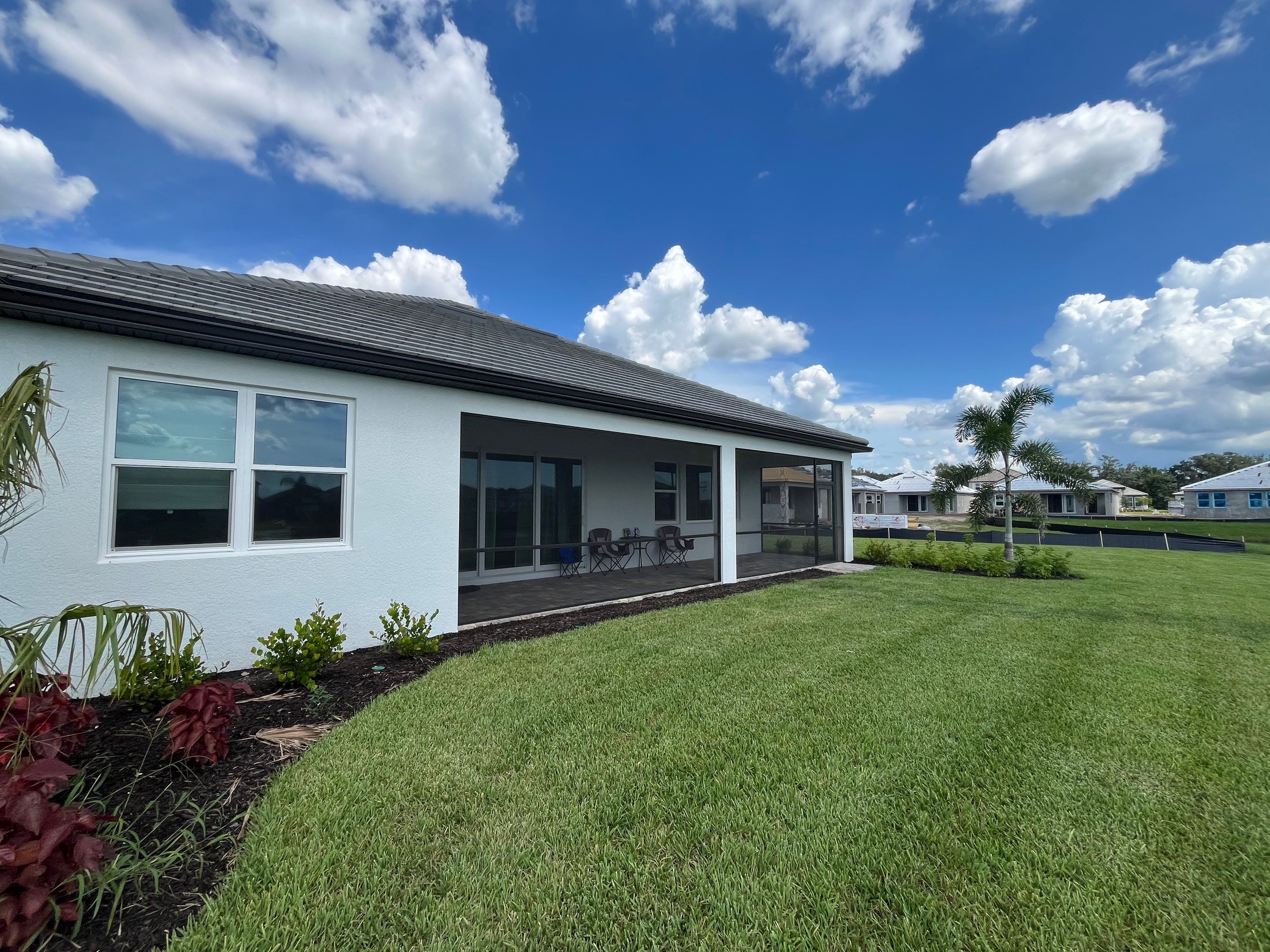 Modern Black Bronze Seamless Gutters for a Stylish Home by Gutter Professors