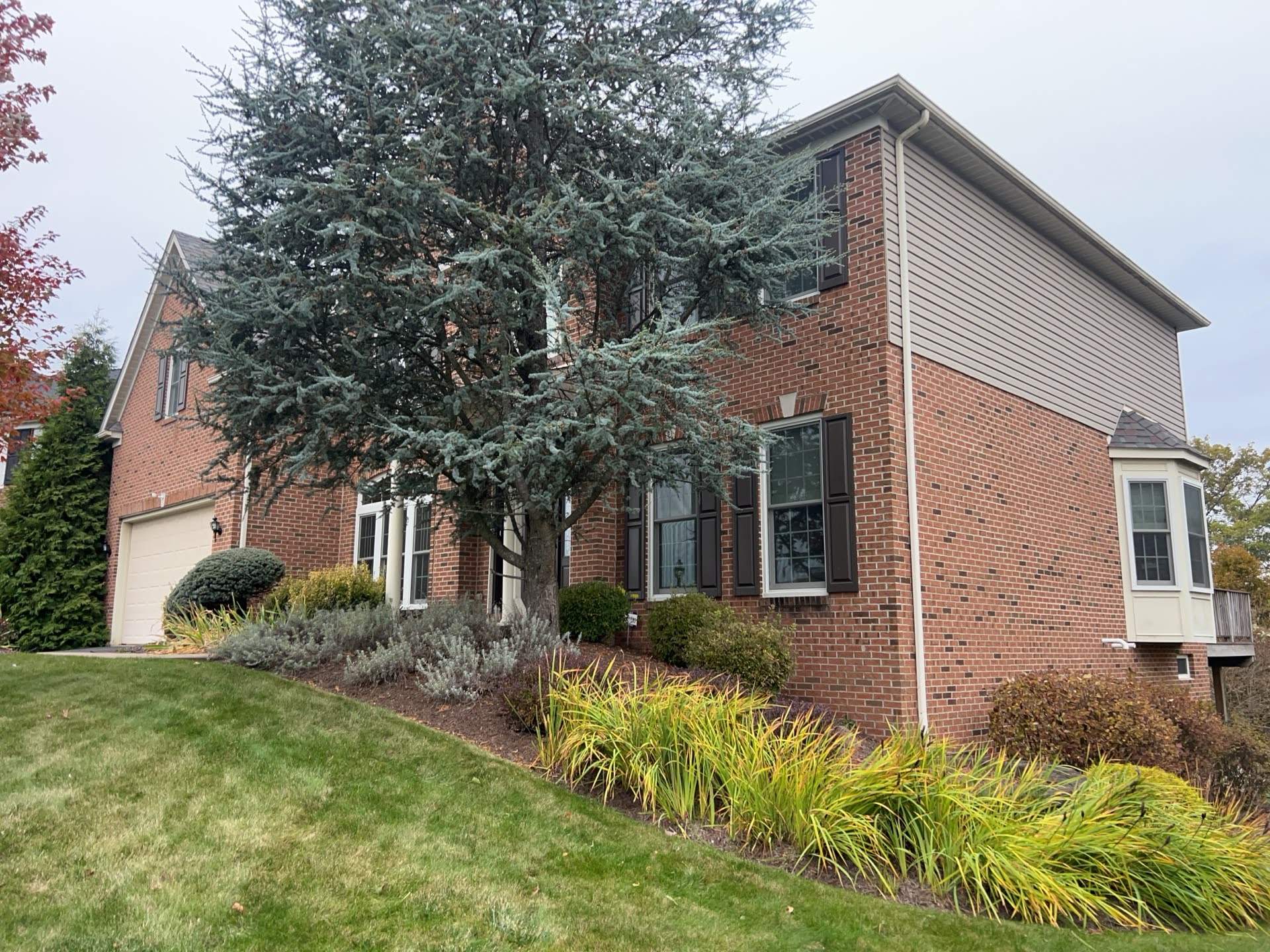 Partial Siding Renovation with Tan Vinyl Siding in Canonsburg by Ideal Siding Pittsburgh