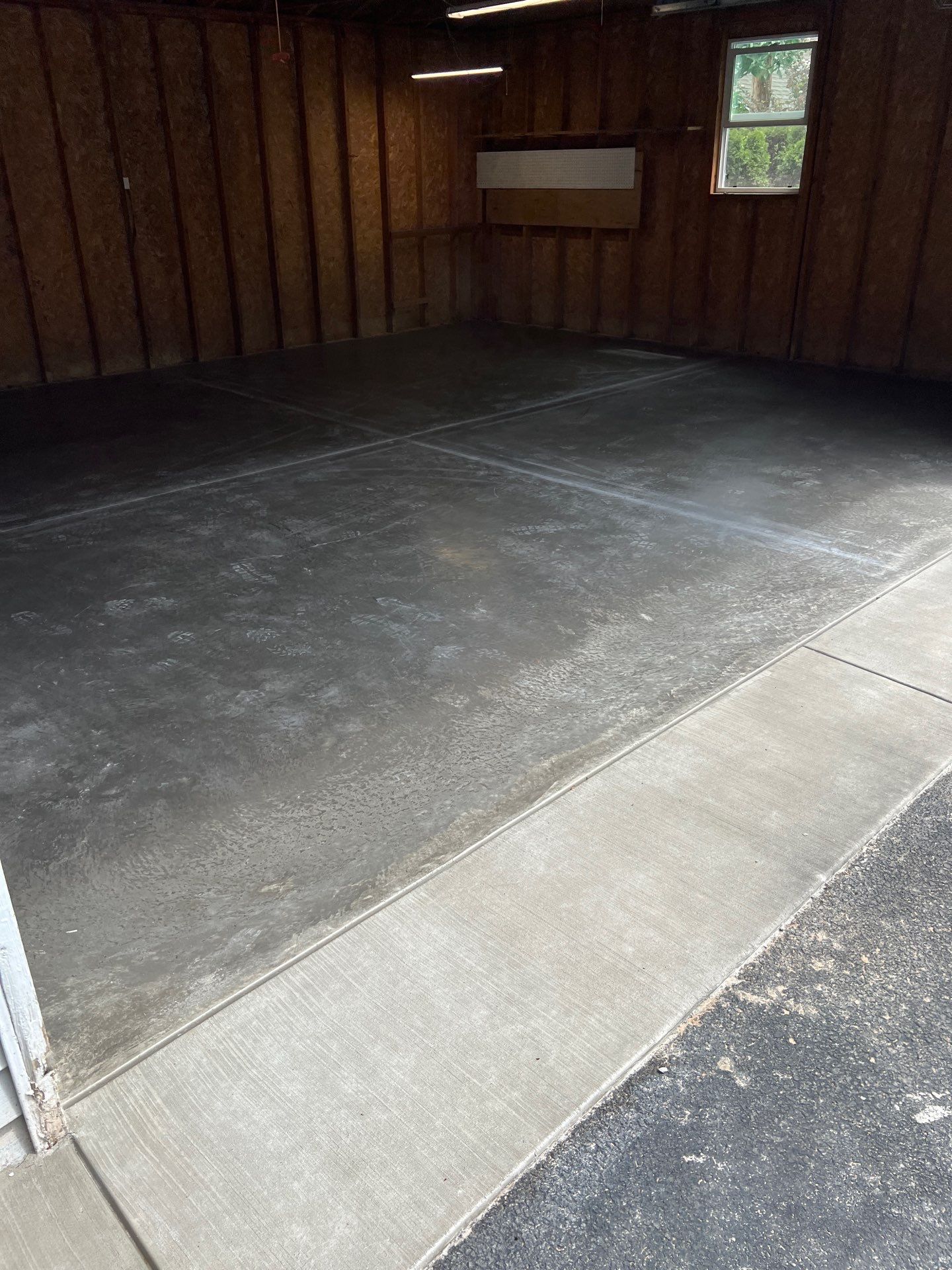 Concrete garage floor replacement  by NG Masonry & Construction LLC