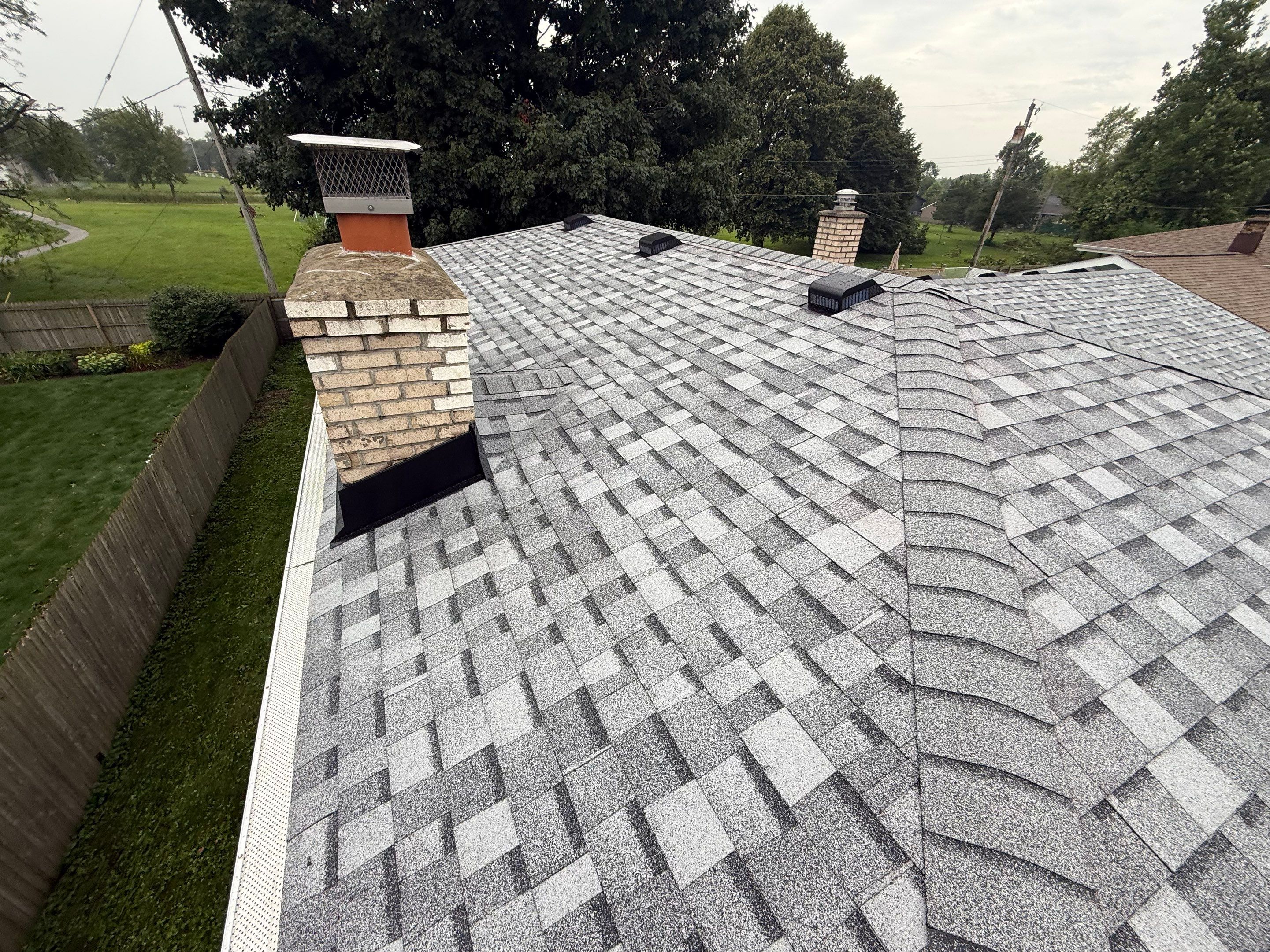 Roofing & gutters by Optimal Home Improvement 