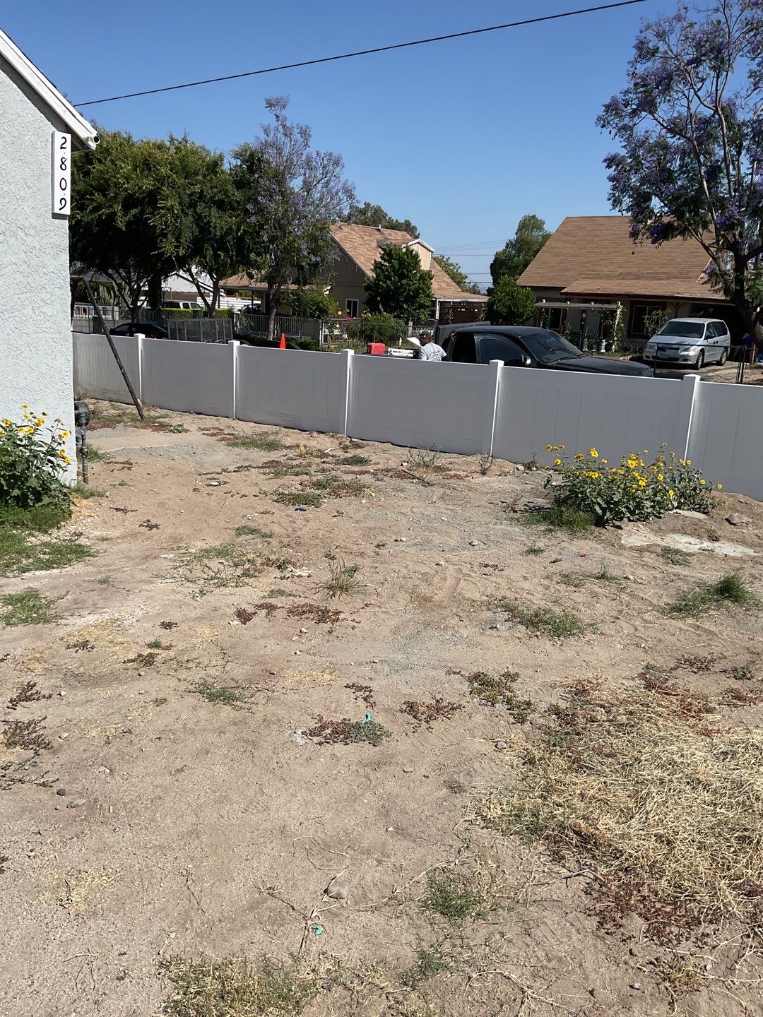 Fence installation using 6ft and 4ft vinyl  by Fence Guys Inc. 