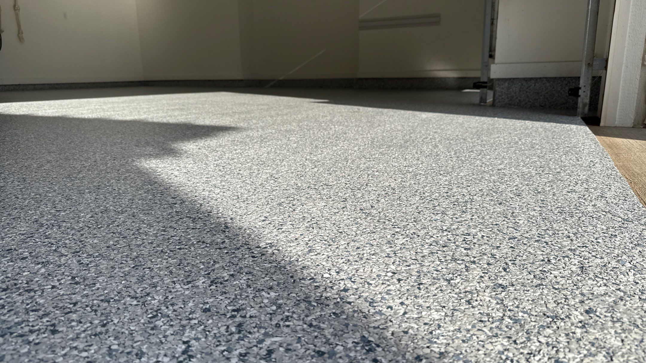 Nick's New Floor & Storage Looks Beautiful by Banner Garage