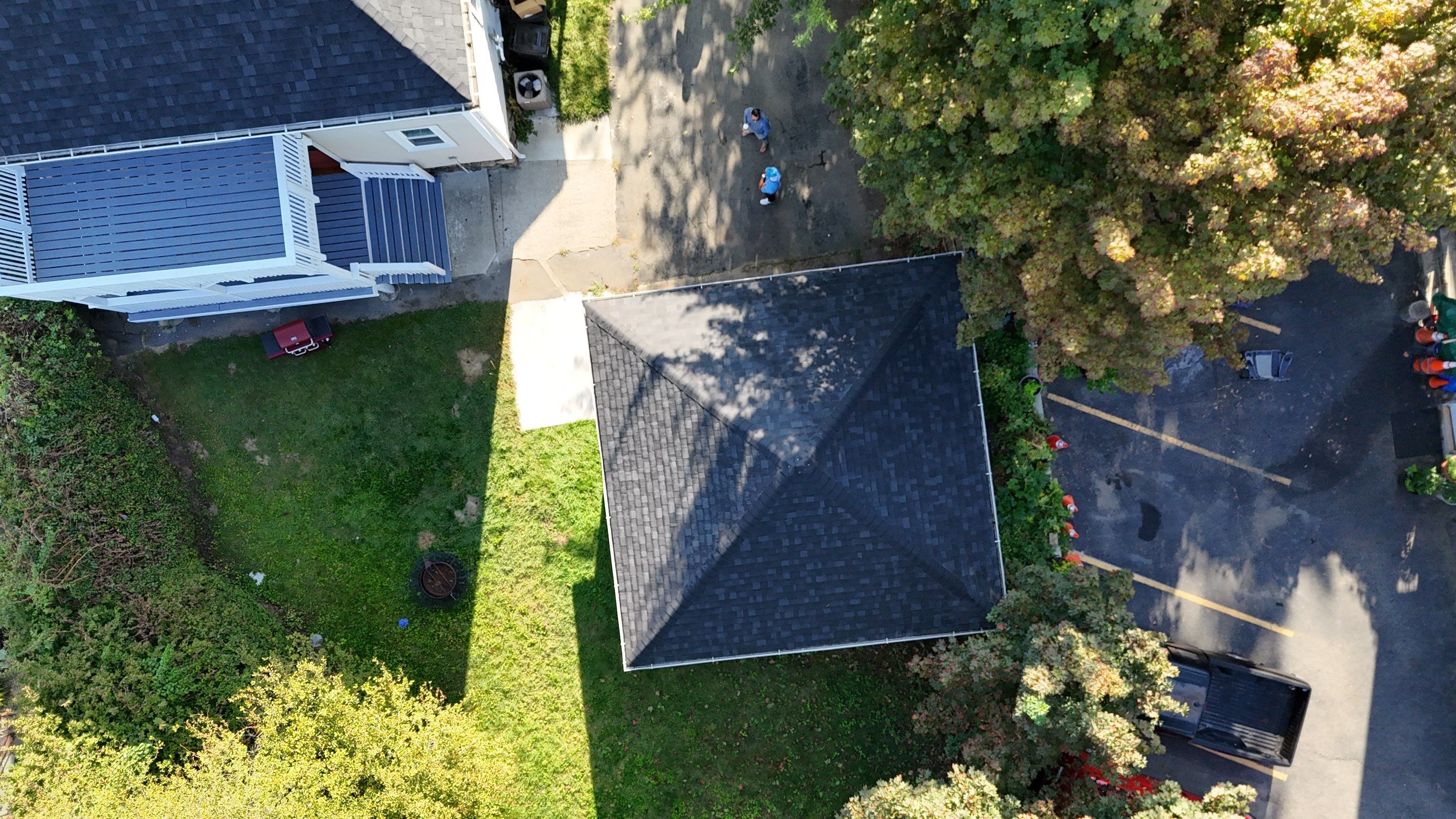 Roof Replacement with Skylight Flashing in Waltham, MA by Mighty Dog Roofing of Greater Middlesex County