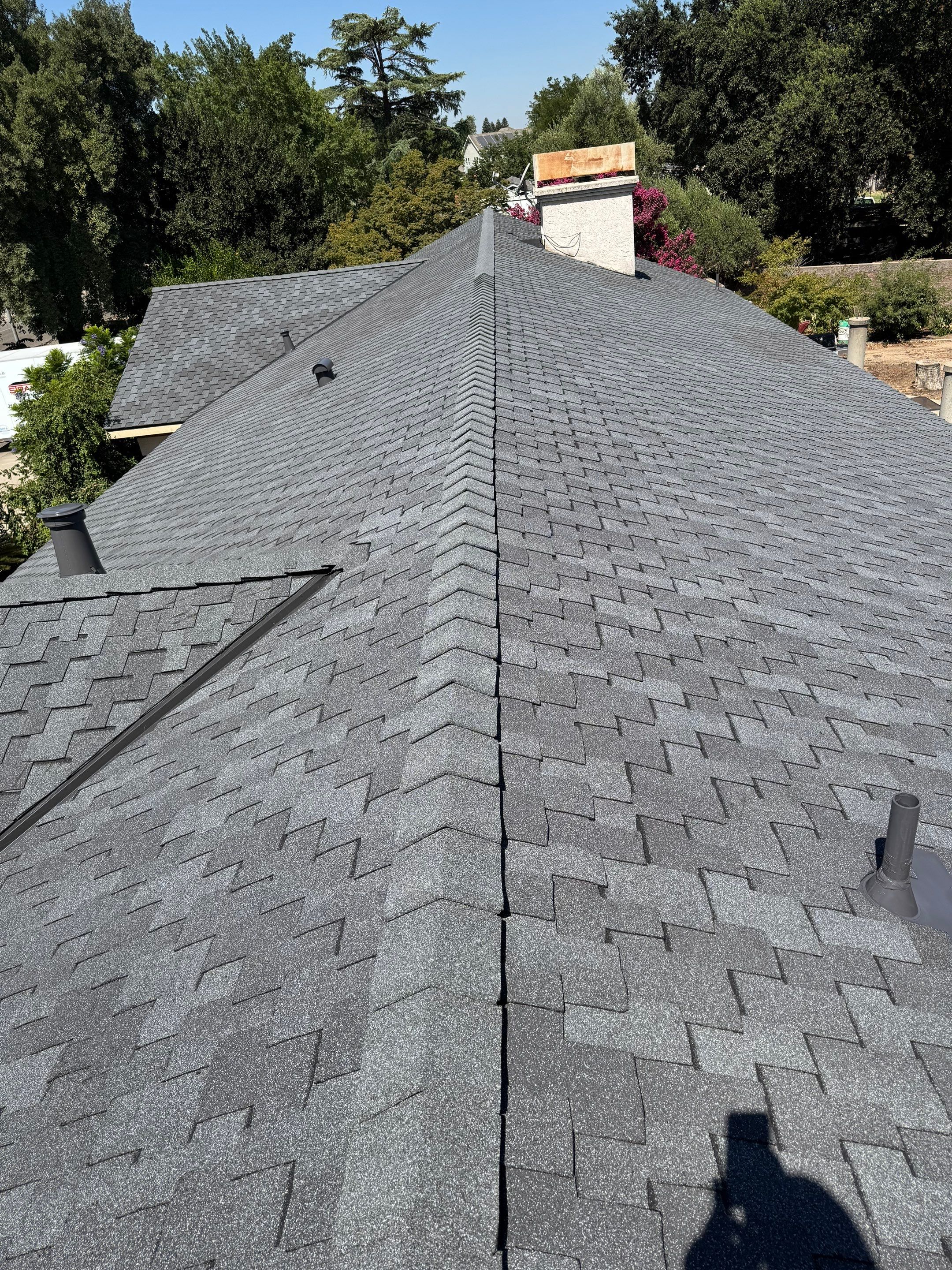 Presidential shingle roof by Straight Edge Roofing Inc