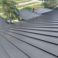 24ga 1.5" Mechanical Seam Dark Bronze by Total Roofing System The Metal Roof Experts