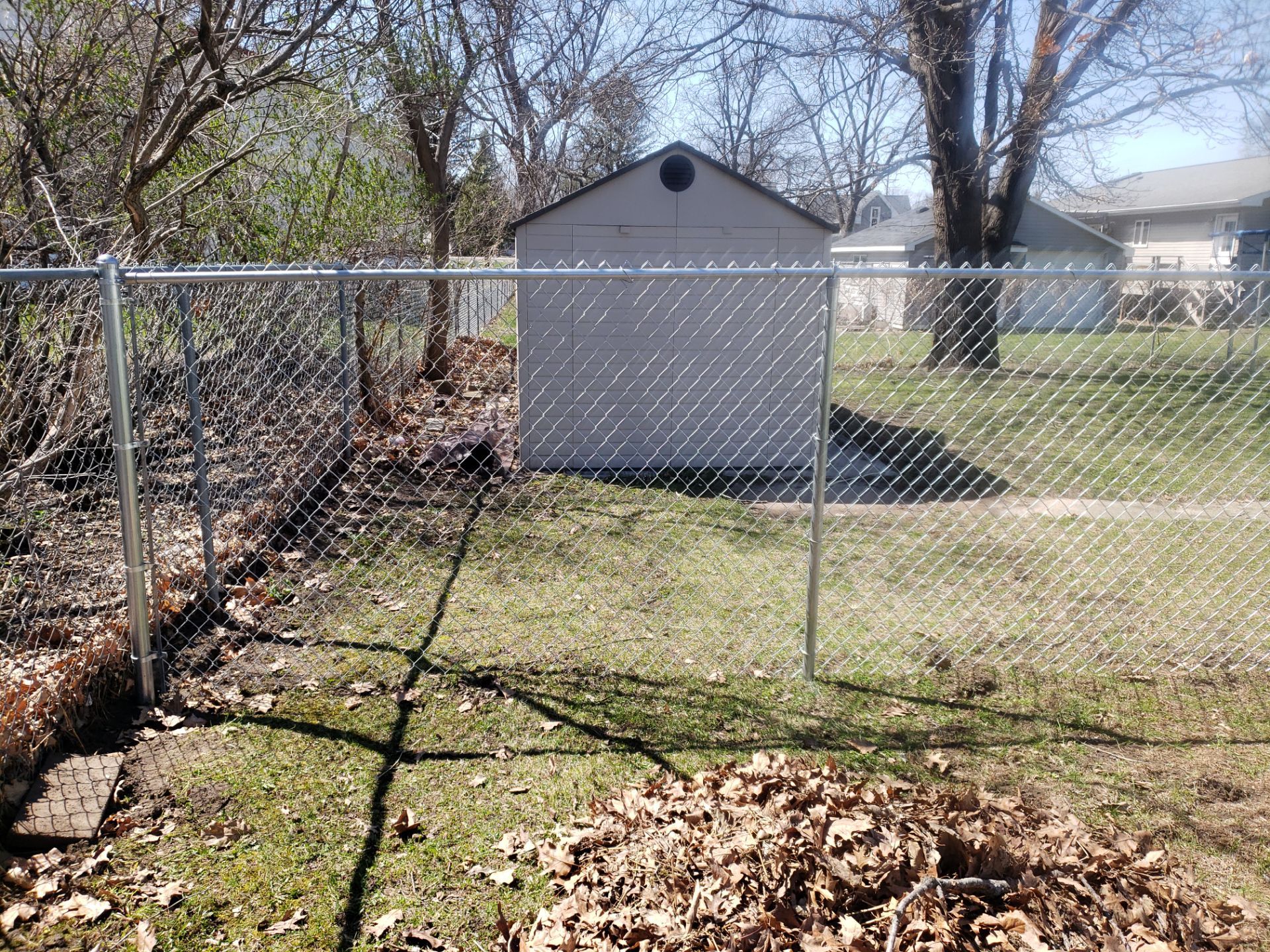 Residential Galvanized Chain Link Perimeter Fencing and Gate Installation by Perfect Picket Fence and Stain