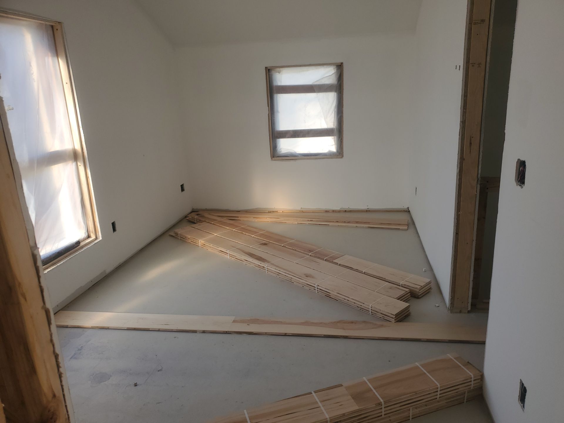 Full glue down Installation over radiant heat 7" Maple character grade by Ann Arbor Hardwoods 