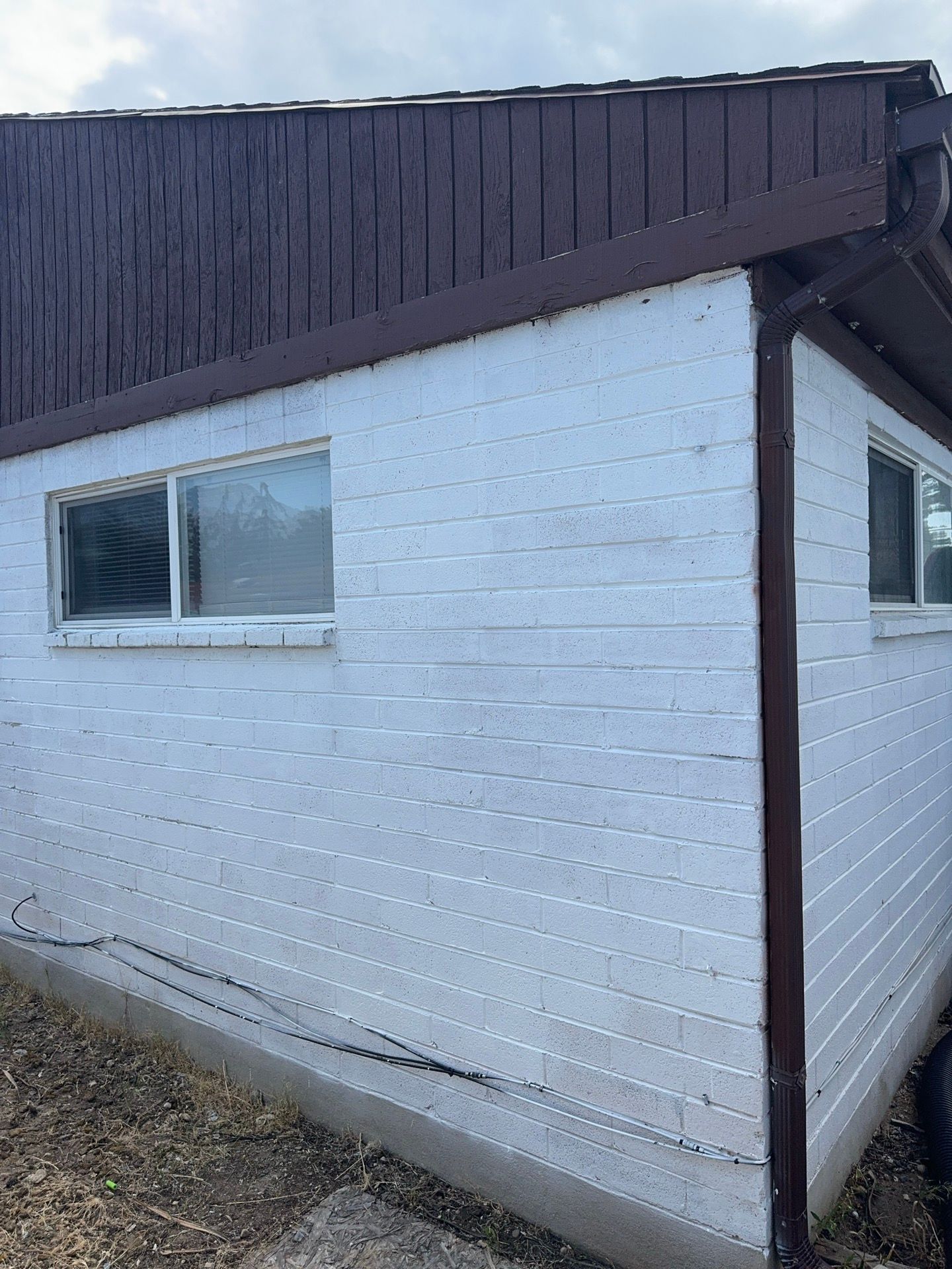 Sandy | Cedar Overlay Vinyl Installation | Nightfall & White by Ideal Siding Utah