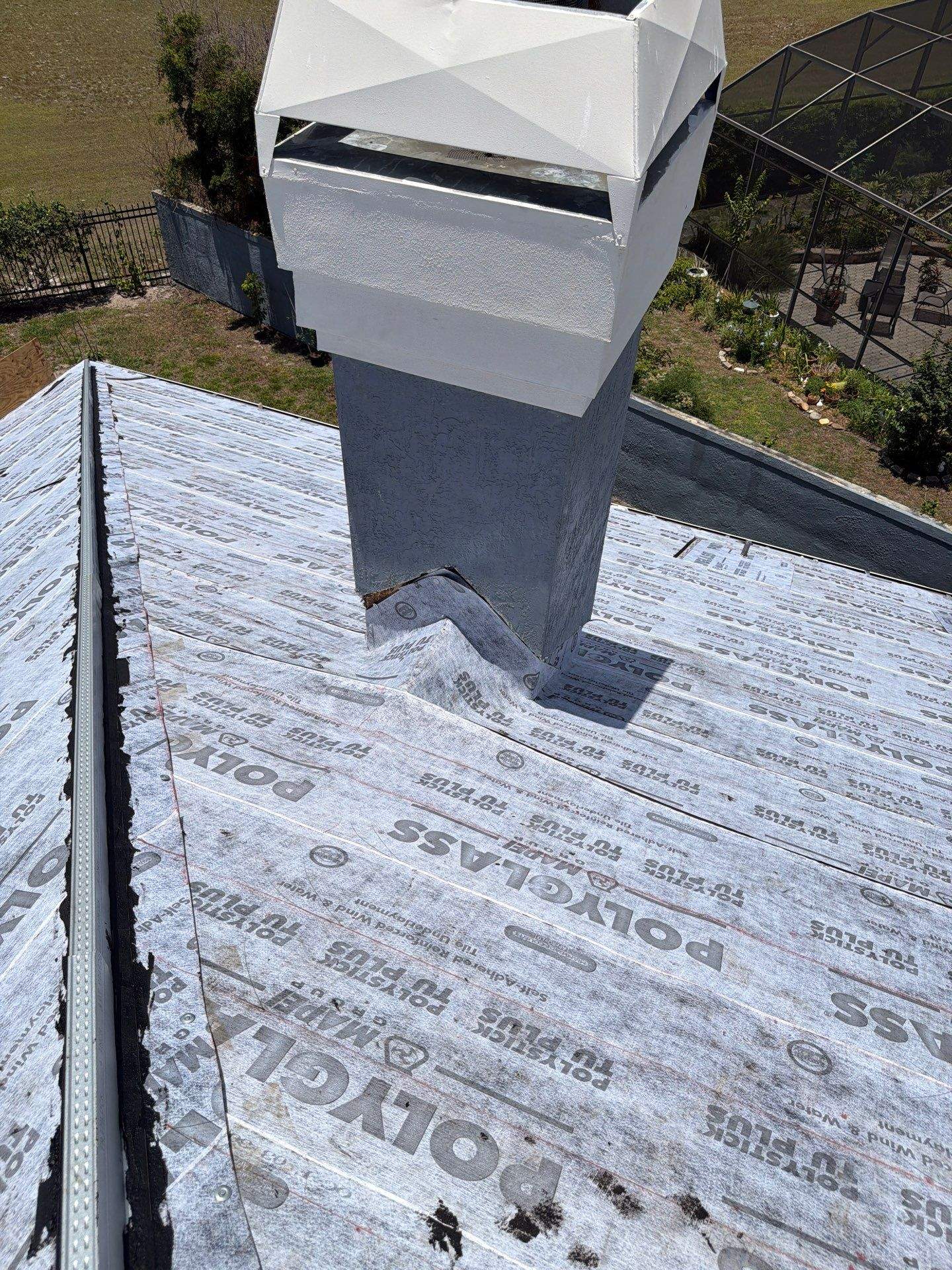 Winter Park Concrete Tile Roof Replacement and Chimney Flashing Installation by Fortified Roofing Solutions Corp.