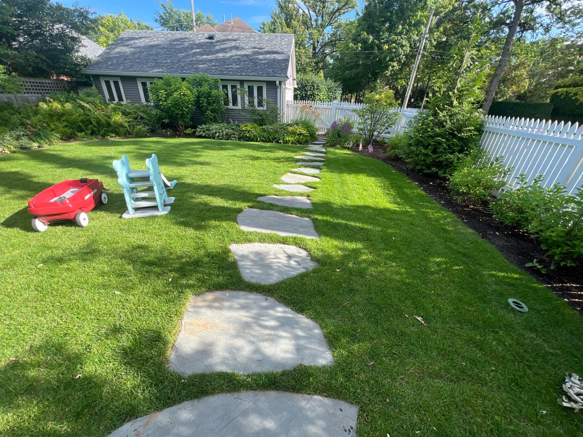 concrete cleaning using Algaecide, soft wash soap by Northern Power Washing LLC.