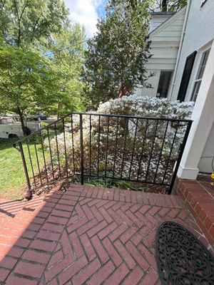 Custom Wrought Iron Handrails for Herringbone Brick Stairs in DC