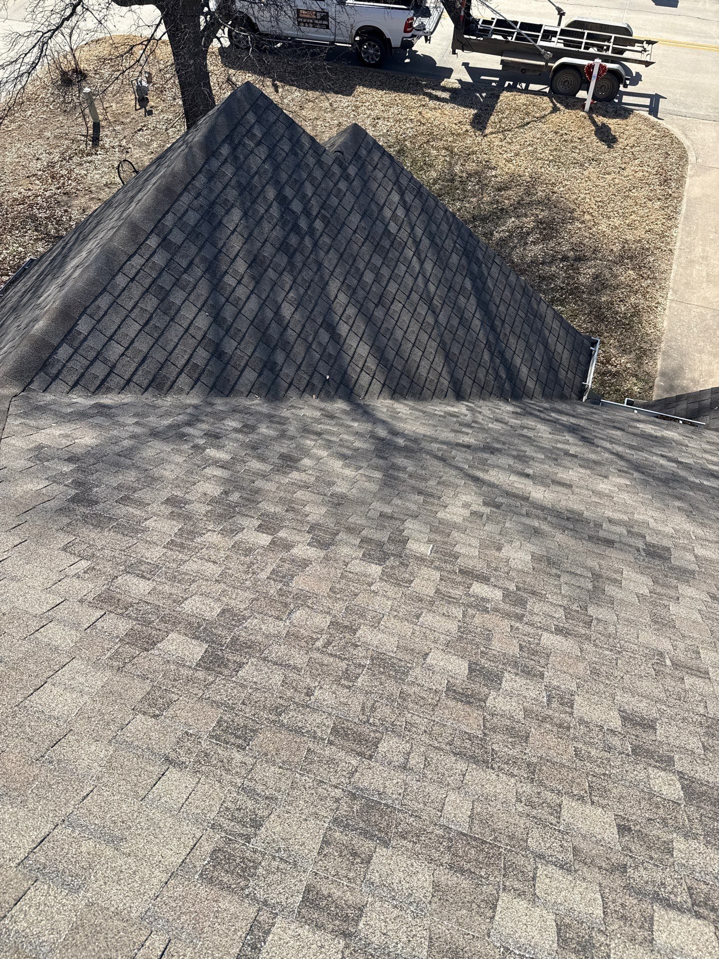 Black roof & gutters!! by In & Out Construction & Remodeling, LLC