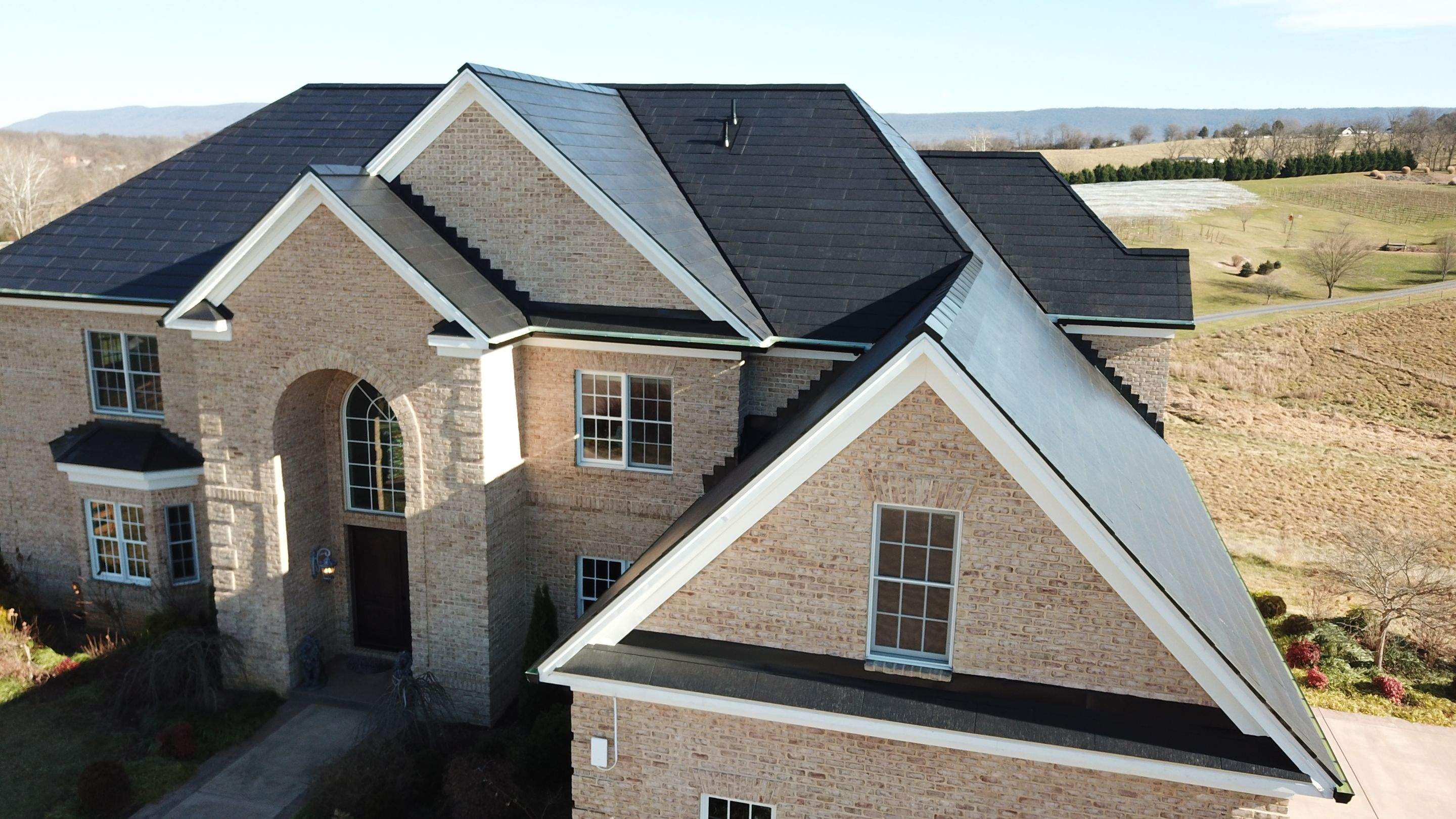 Tesla Solar Roof Replacement by American Home Contractors