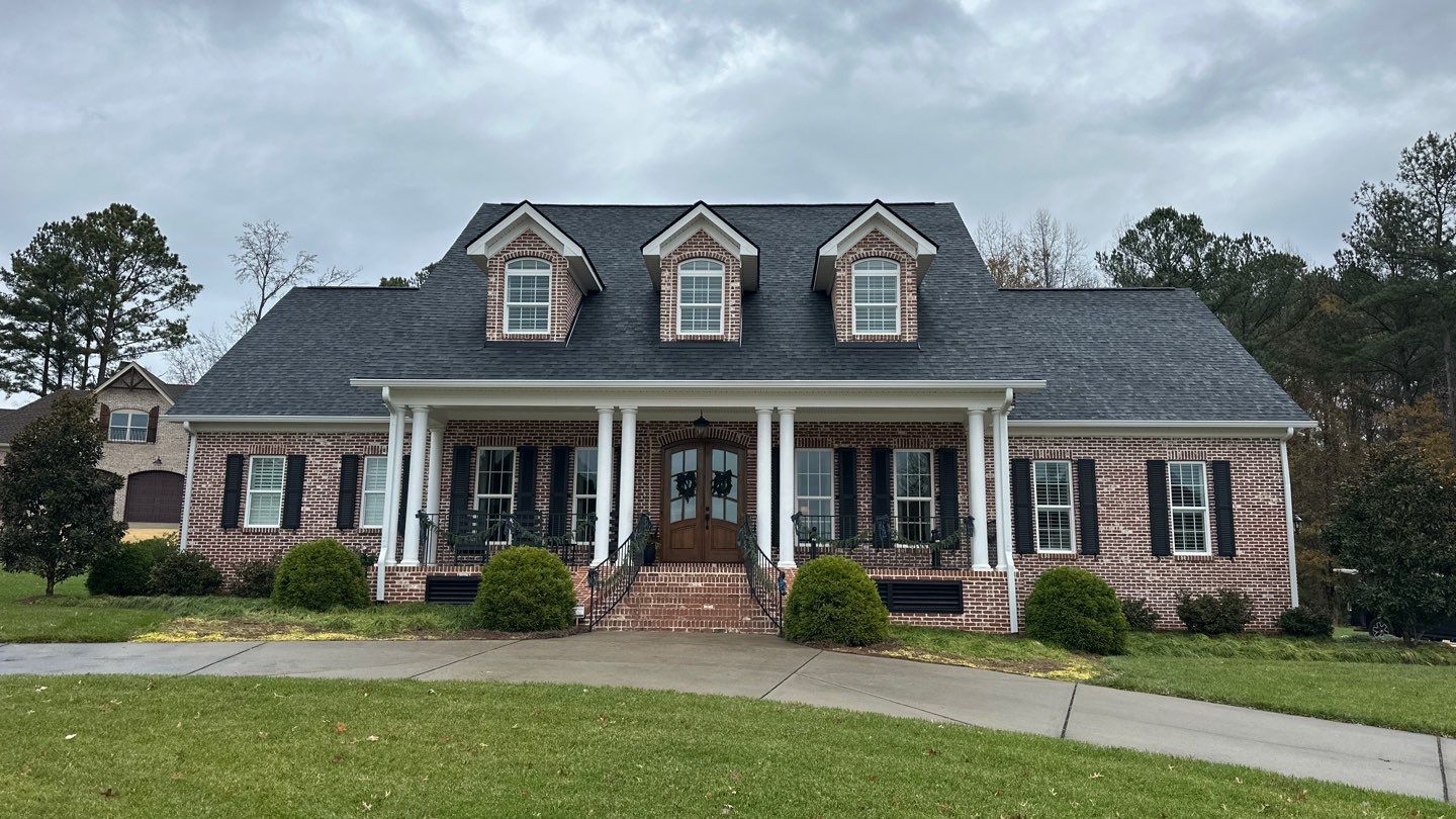 Full Roof Replacement with Oakridge Shingles and Gutter Guards in Rock Hill by Merritt Roofing LLC