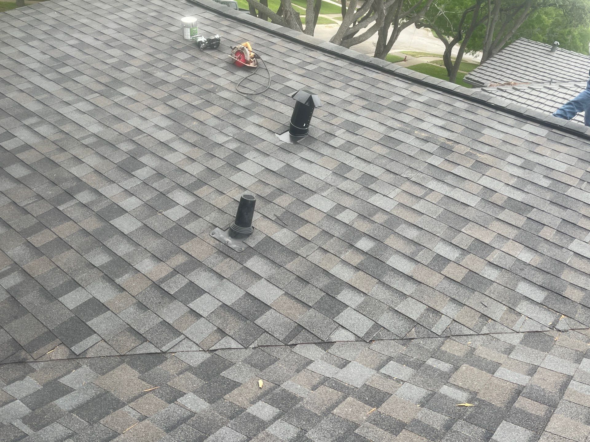 Colored Vinyl Windows to blend into brick by Bayfront Roofing and Construction