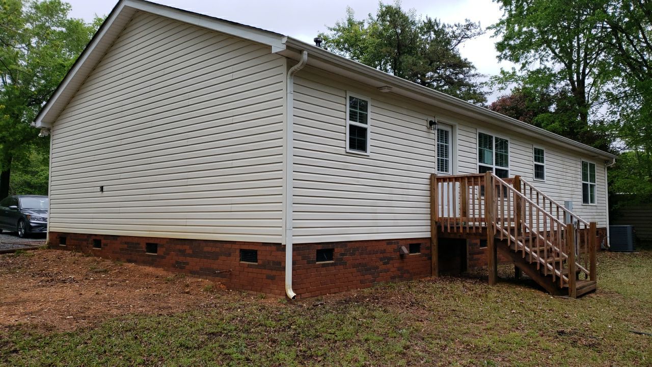 House Wash using cleaner by Power Wash Masters LLC