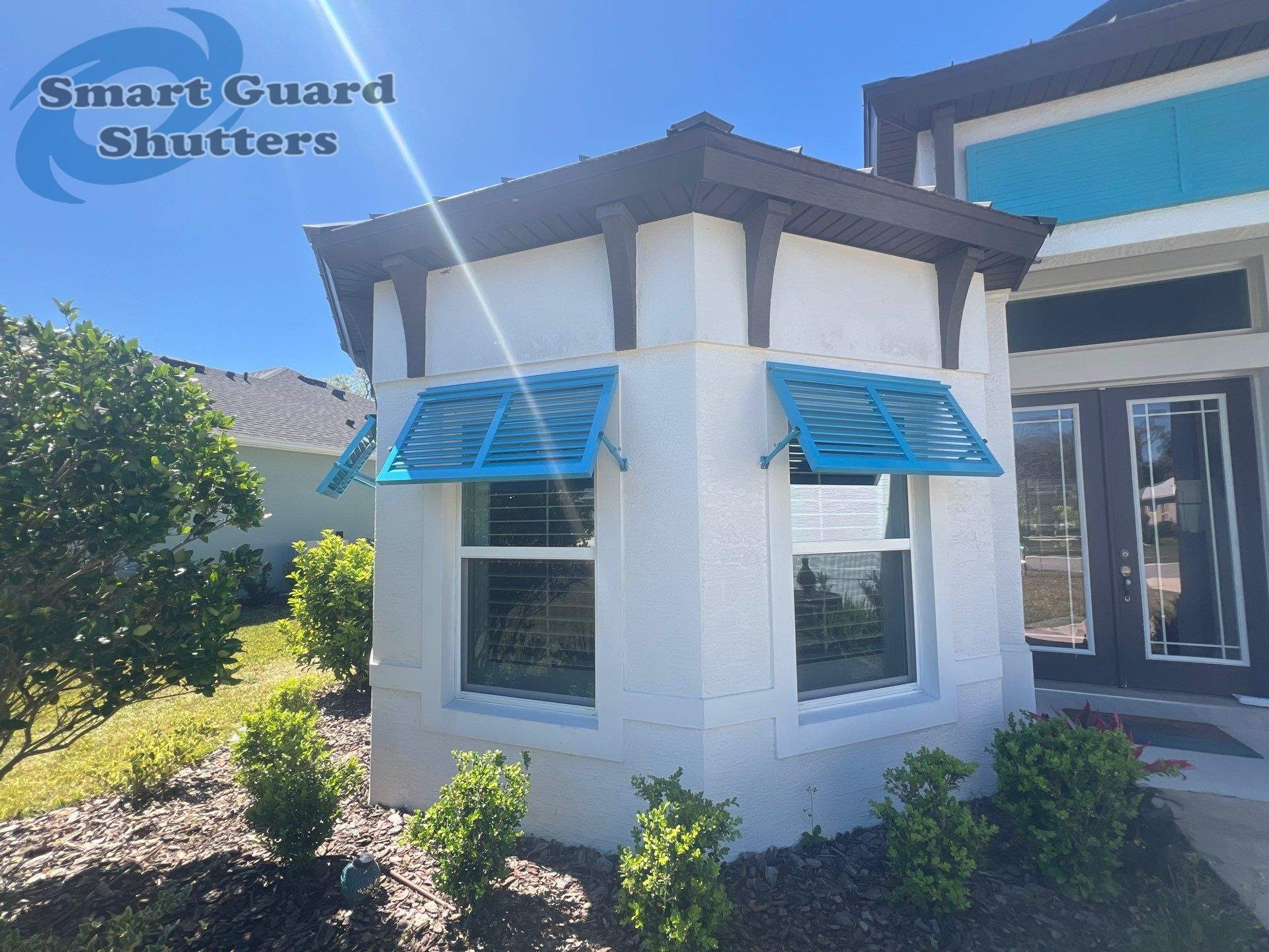 Decorative Bahamas in Throw Back Blue  by Smart Guard Shutters
