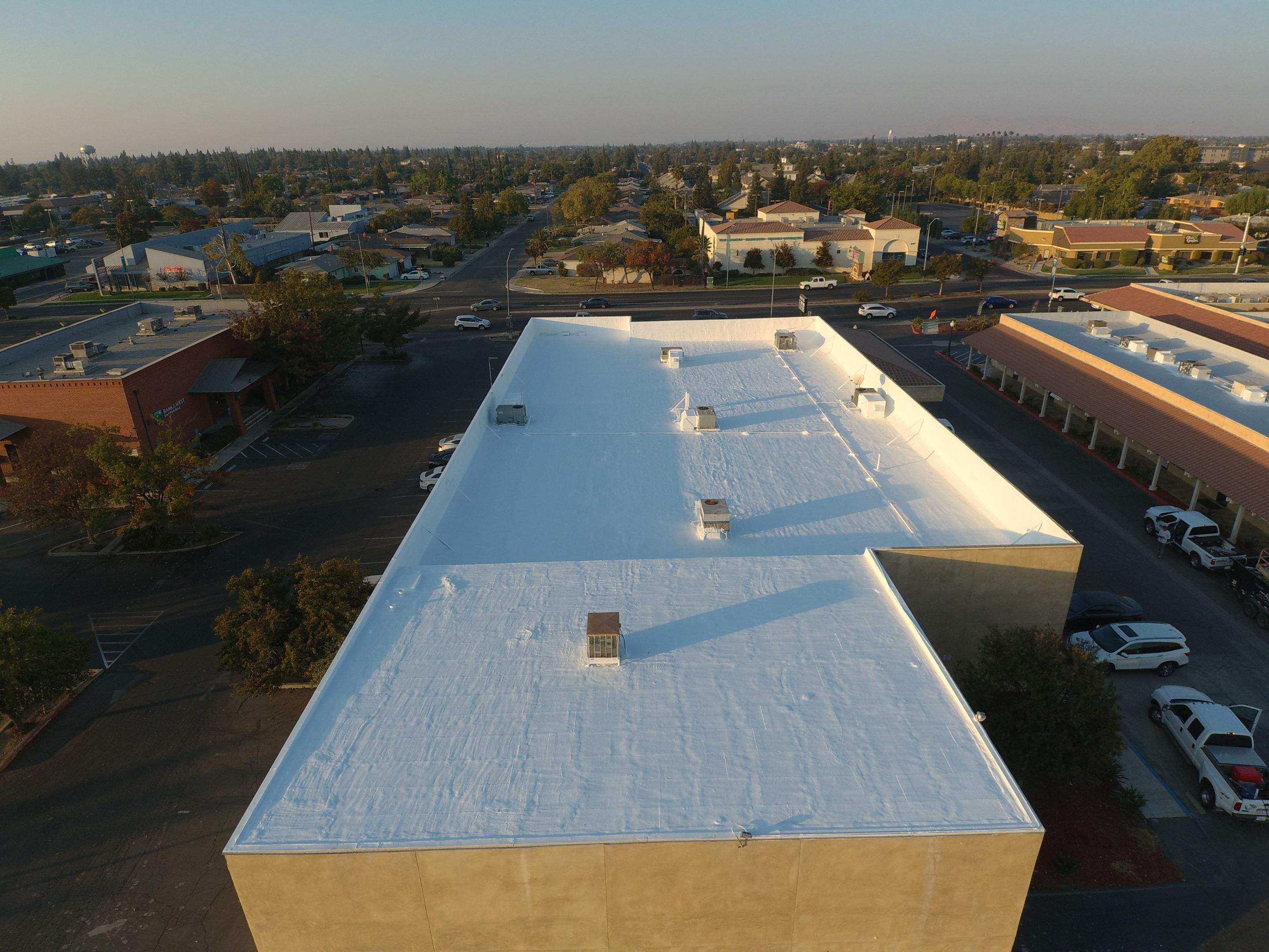 Reburbish existing spray foam job by Straight Edge Roofing Inc
