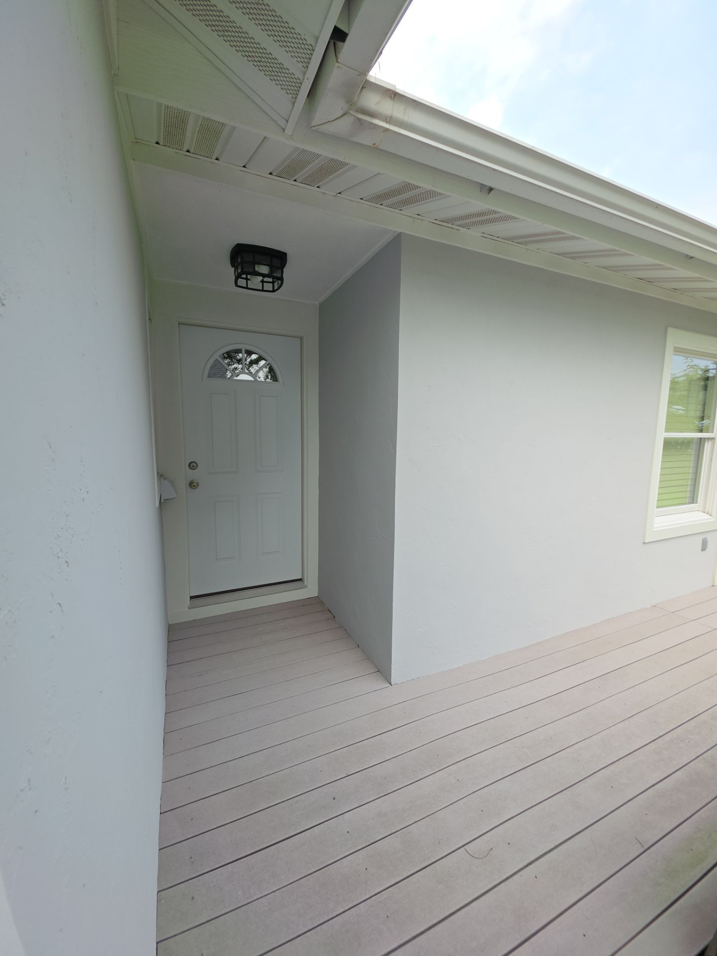 Norton Shores Residential Stucco Repair and Exterior Painting Refresh by Gordon Painting