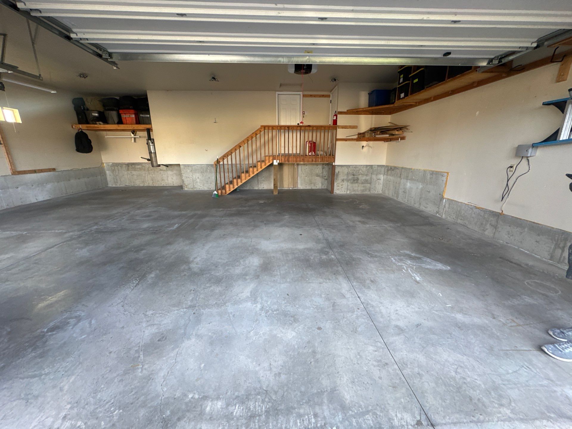 Custom Gray Speckled Polyaspartic Garage Floor Coating in Cheney by Croc Coatings, LLC