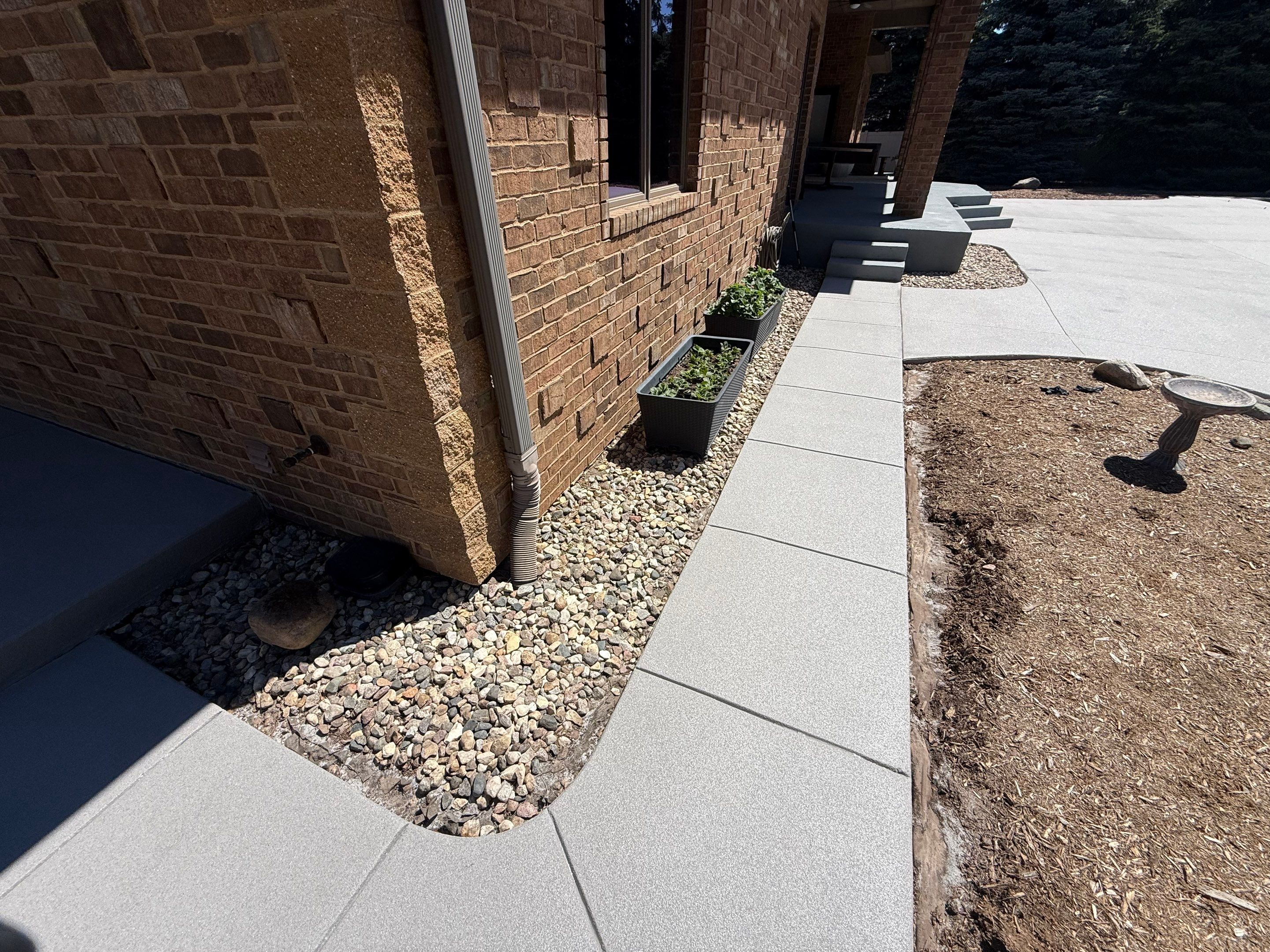 Decorative Concrete Pool Deck and Patio Resurfacing in Sioux Falls by Select Painting, Coatings & Garage Cabinets