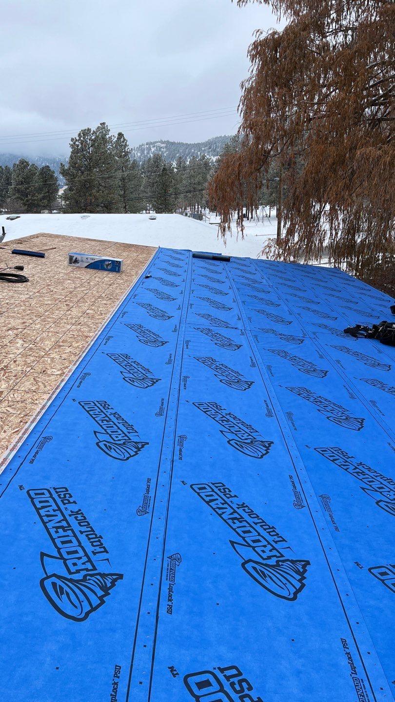 Residential Roofing Installation using 12" Prolok metal  by Top Notch Roofing Inc