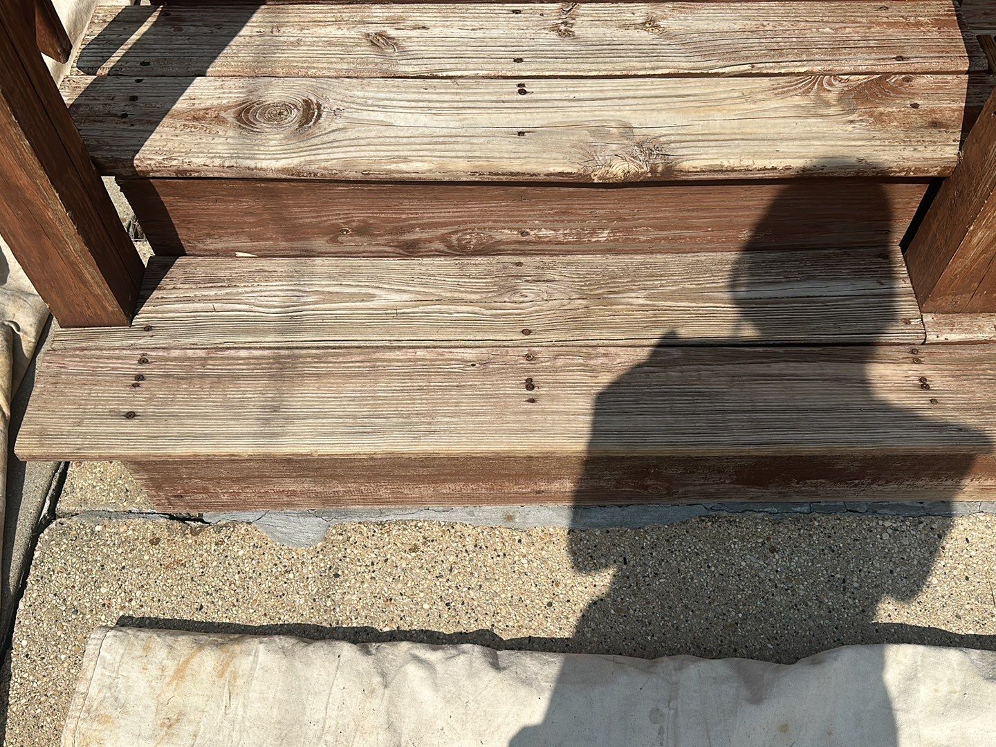 Wood cleaning and staining using Armstrong cloark oil stain by Northern Power Washing LLC.