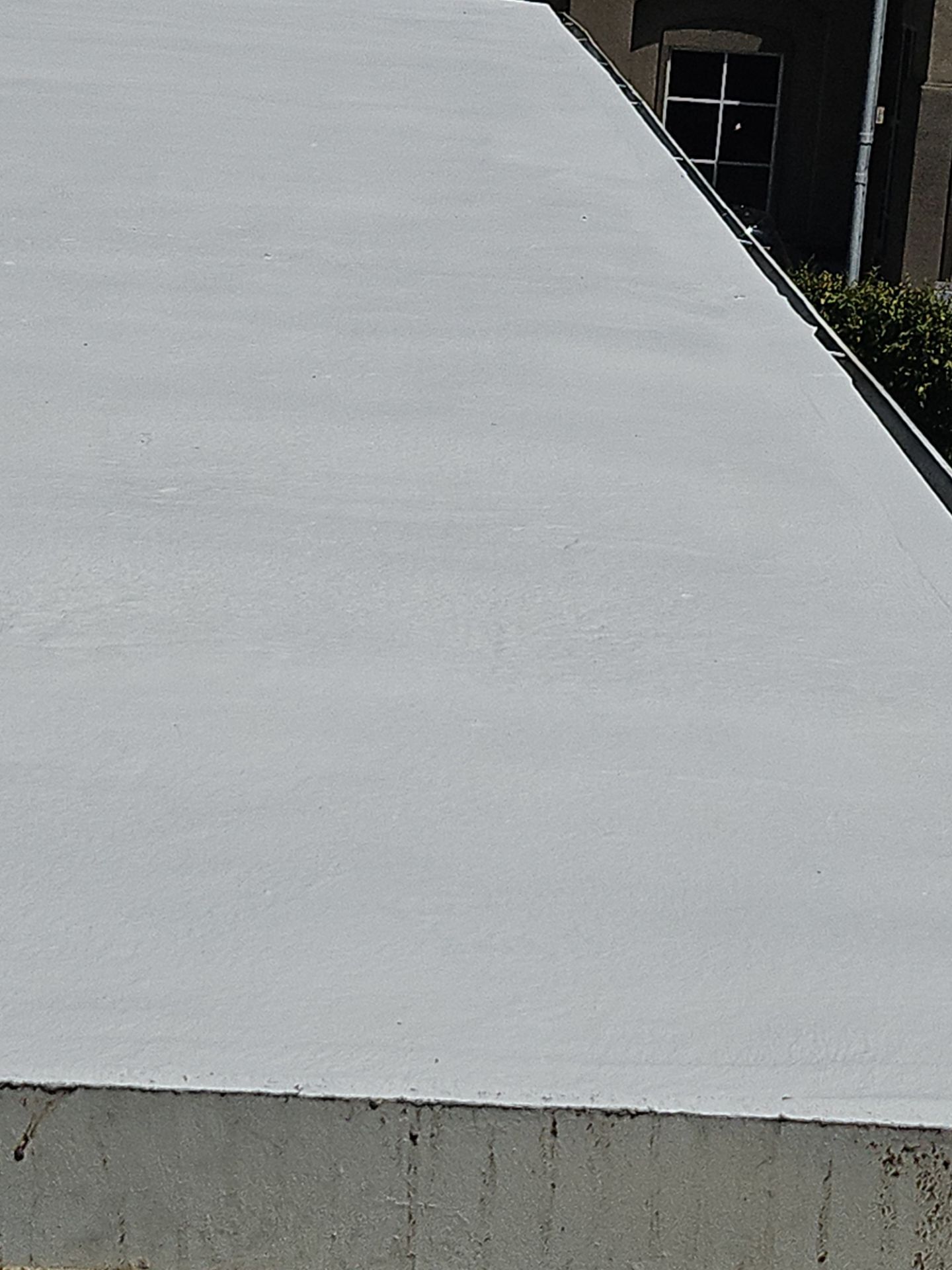 Foam Refurbish using General Coatings acrylic coatings and spray foam by Straight Edge Roofing Inc