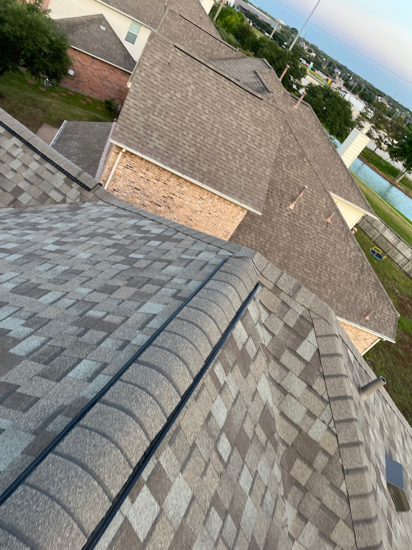 Residential Roofing Installation using Owen's Corning Duration (Lifetime) Shingles by Roof Repair Company