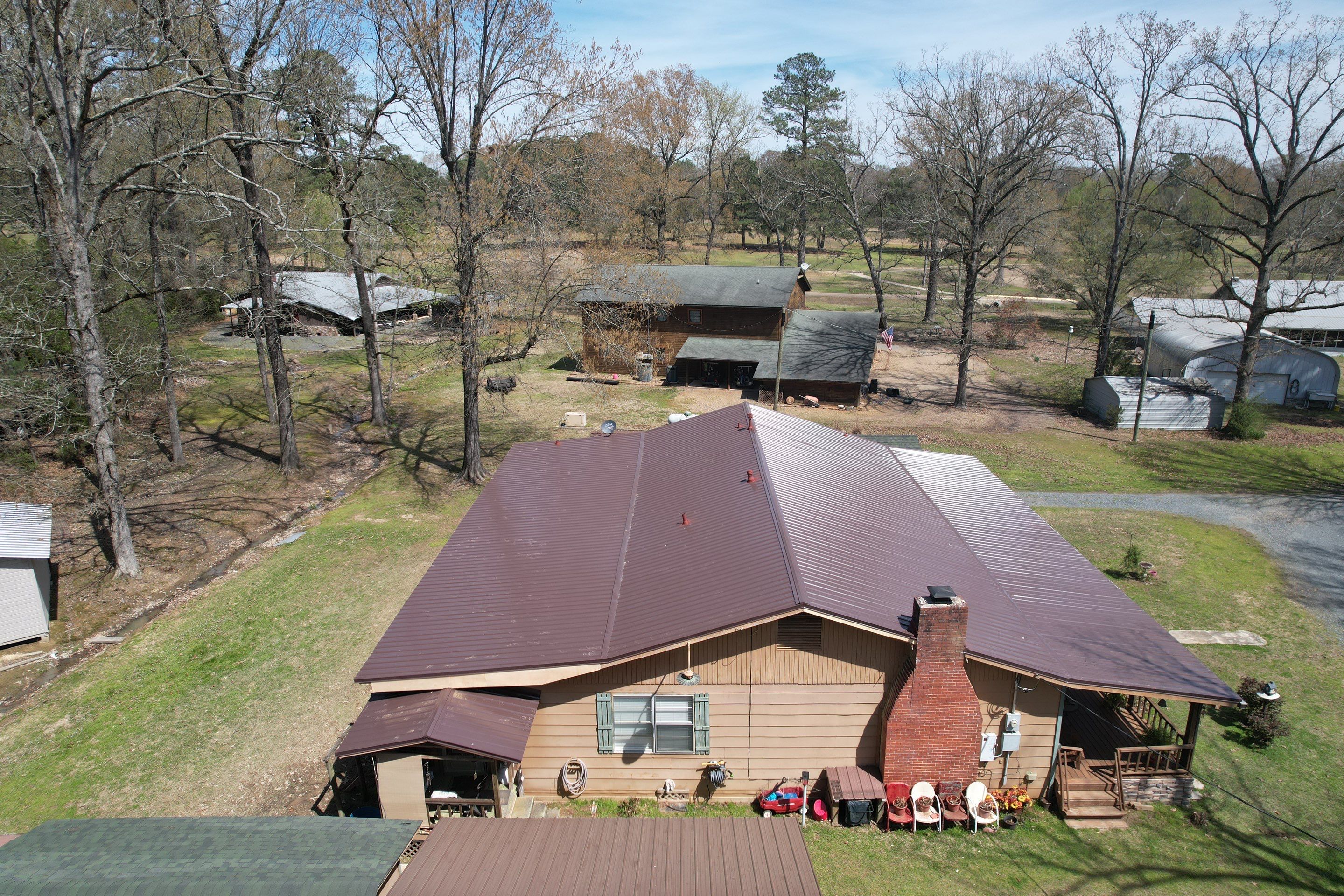 Residential Roofing Installation using 29 Gauge Colored Metal by Hostetler Roofing