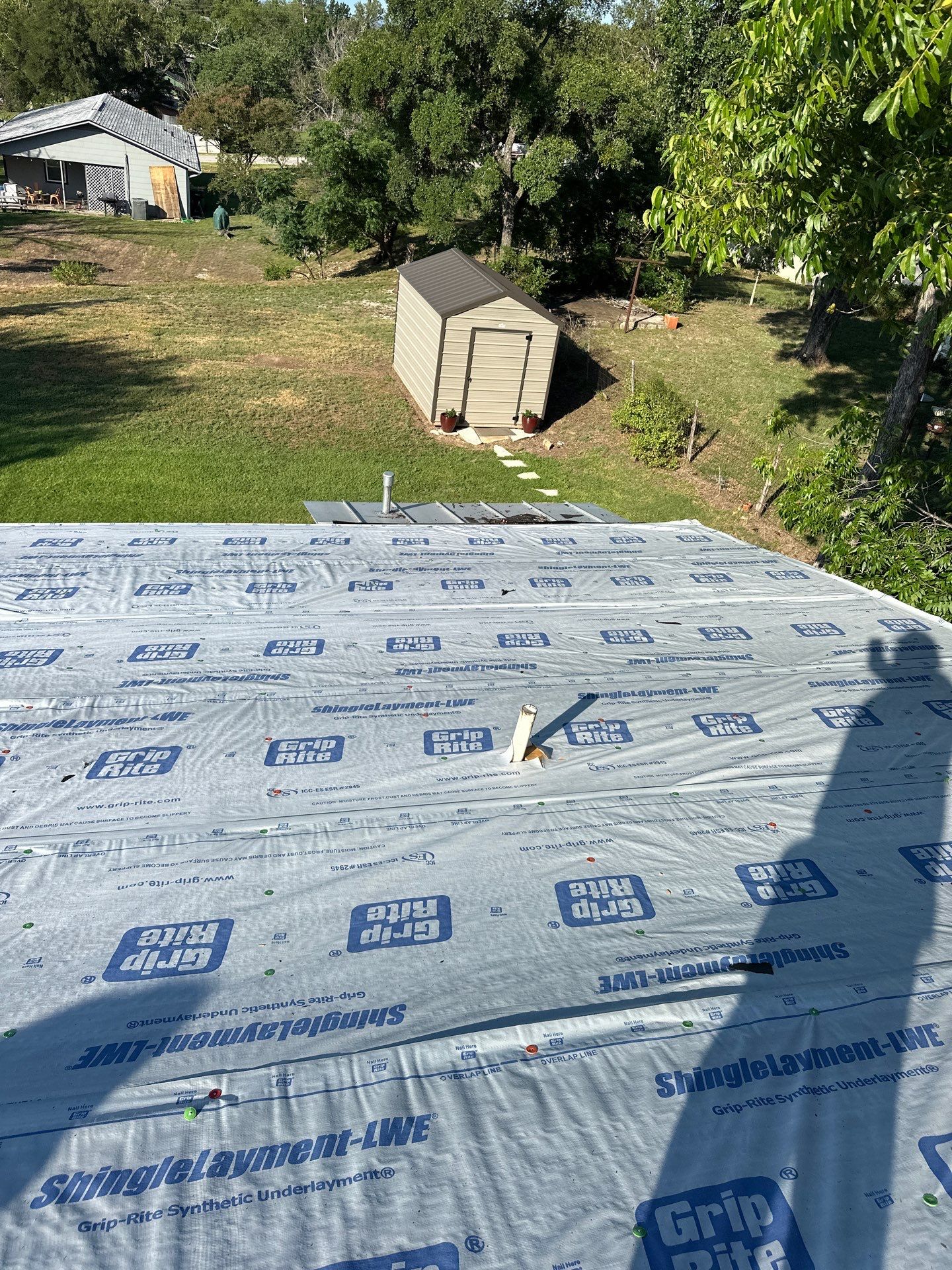 Residential Roofing Installation using Owens Corning Oakridge Onyx Black by DeZign Roofing & Exteriors