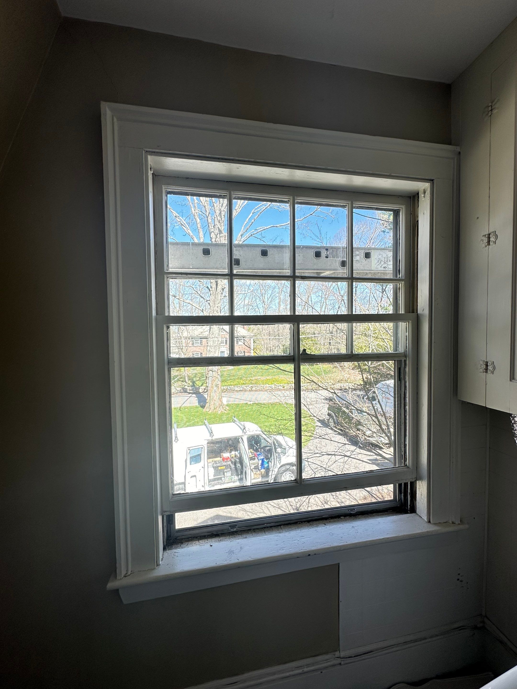 White cedar shingles and windows in Wayland, MA by UBrothers Construction