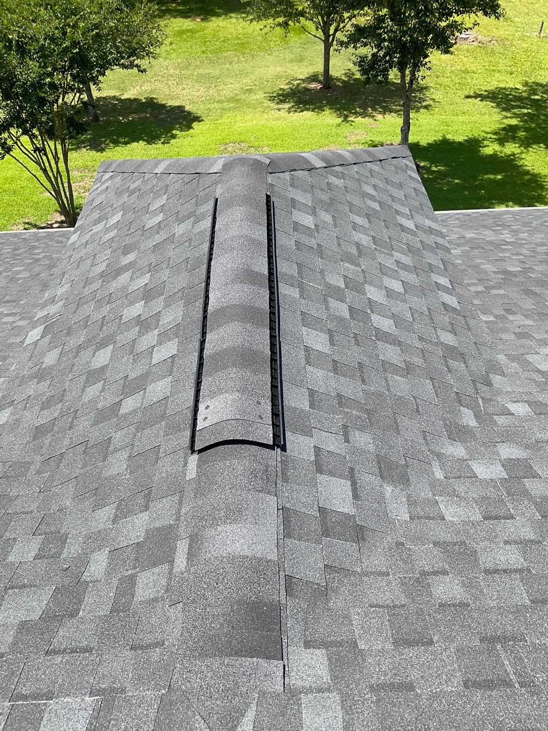 Residential Roofing Installation using Tamko Heritage lifetime shingle in Rustic Black by Sands Roofing & Construction