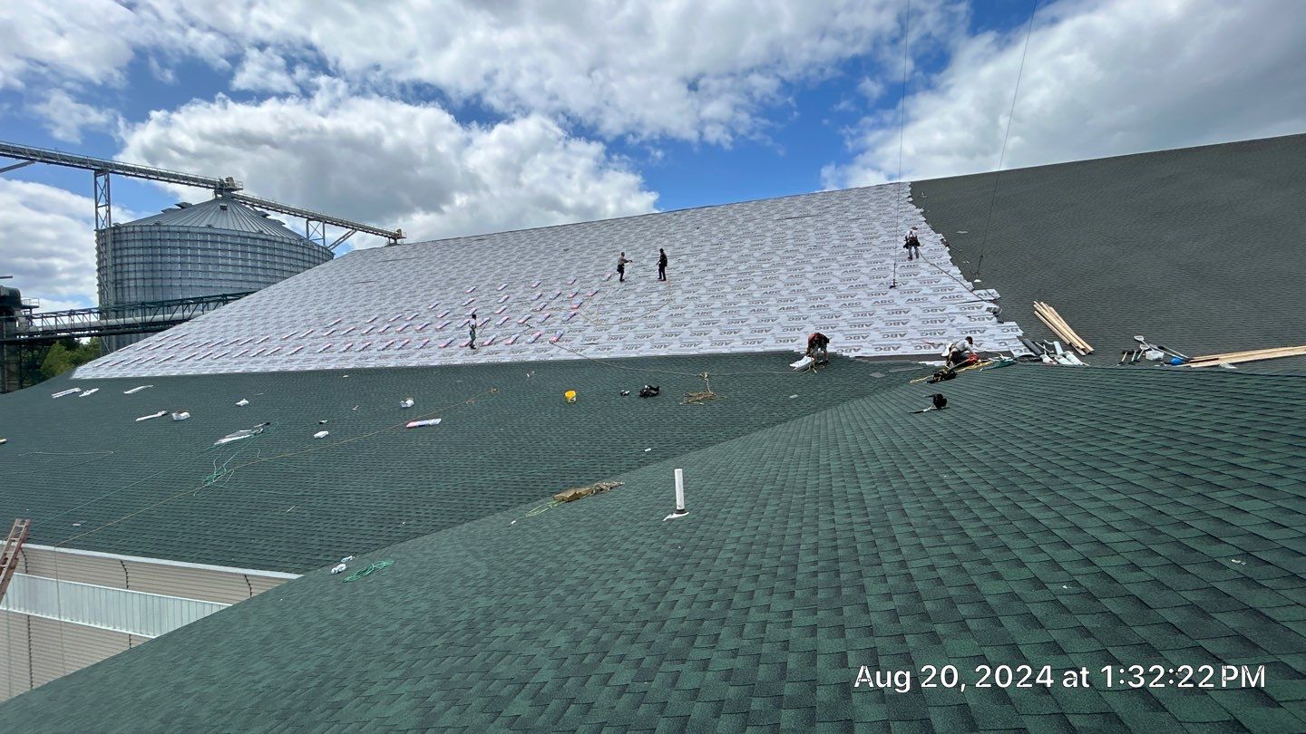 Commercial Roofing Installation using Timberline HDZ Shingles - Hunter Green by RoofX 