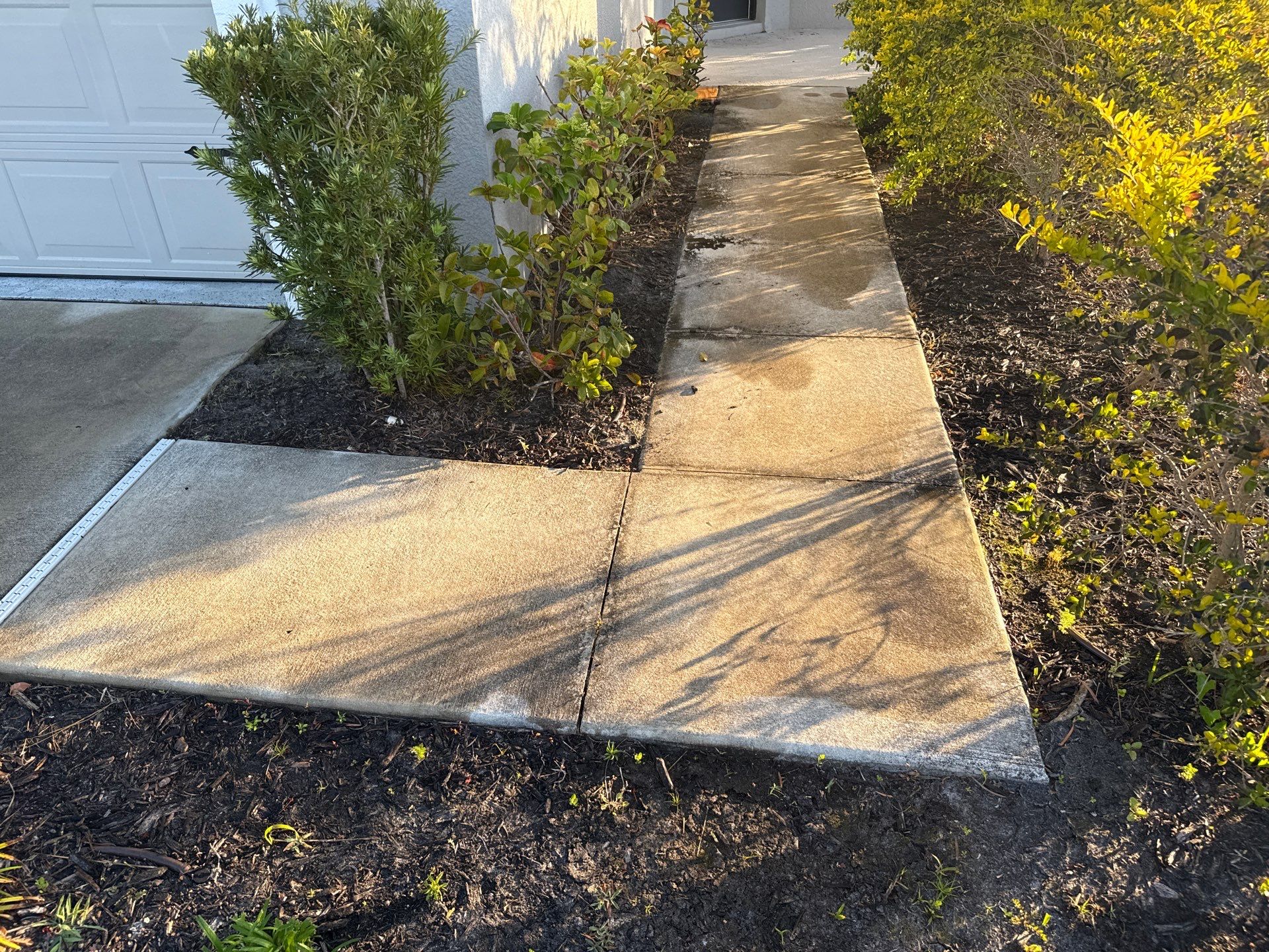 Oil Stain Removal & Concrete Cleaning – The Heights Community, Bradenton, FL by Sunshine AquaWash