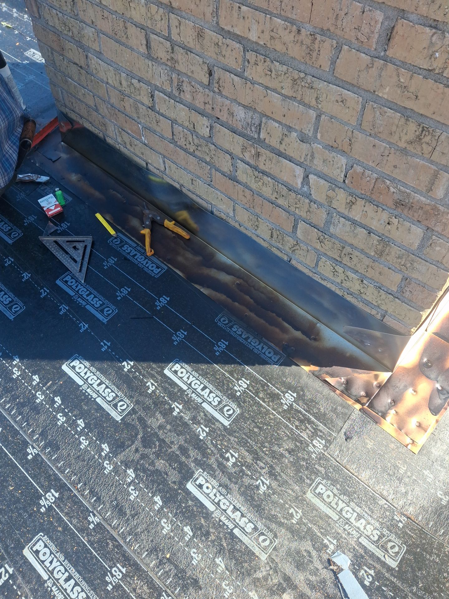 Chimneys need a Cricket.  by Bayfront Roofing and Construction