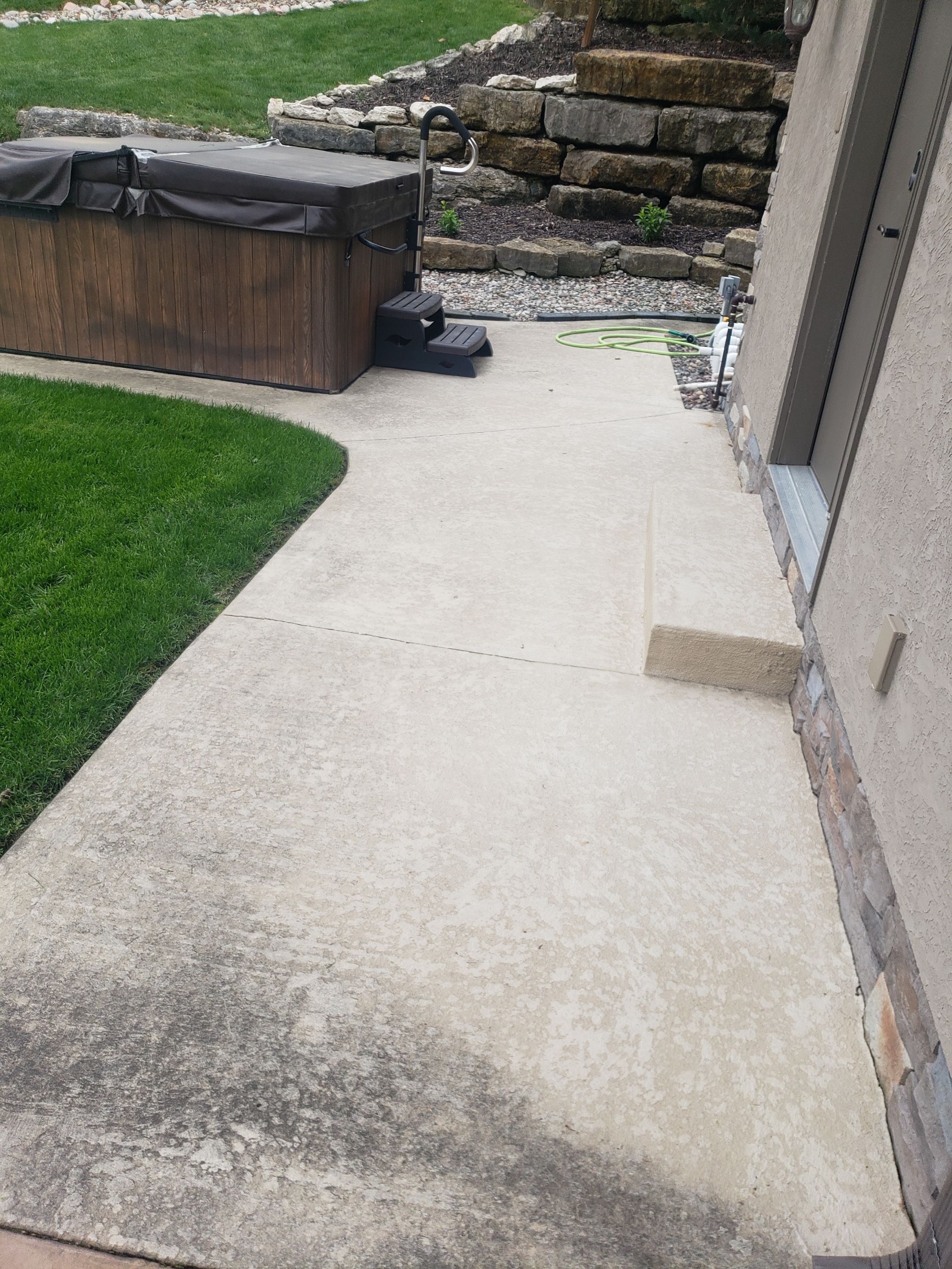 Lake Lotawana -- Front Walkway and Back Patio Tuscan Overlay by Big Red Decorative Concrete, LLC