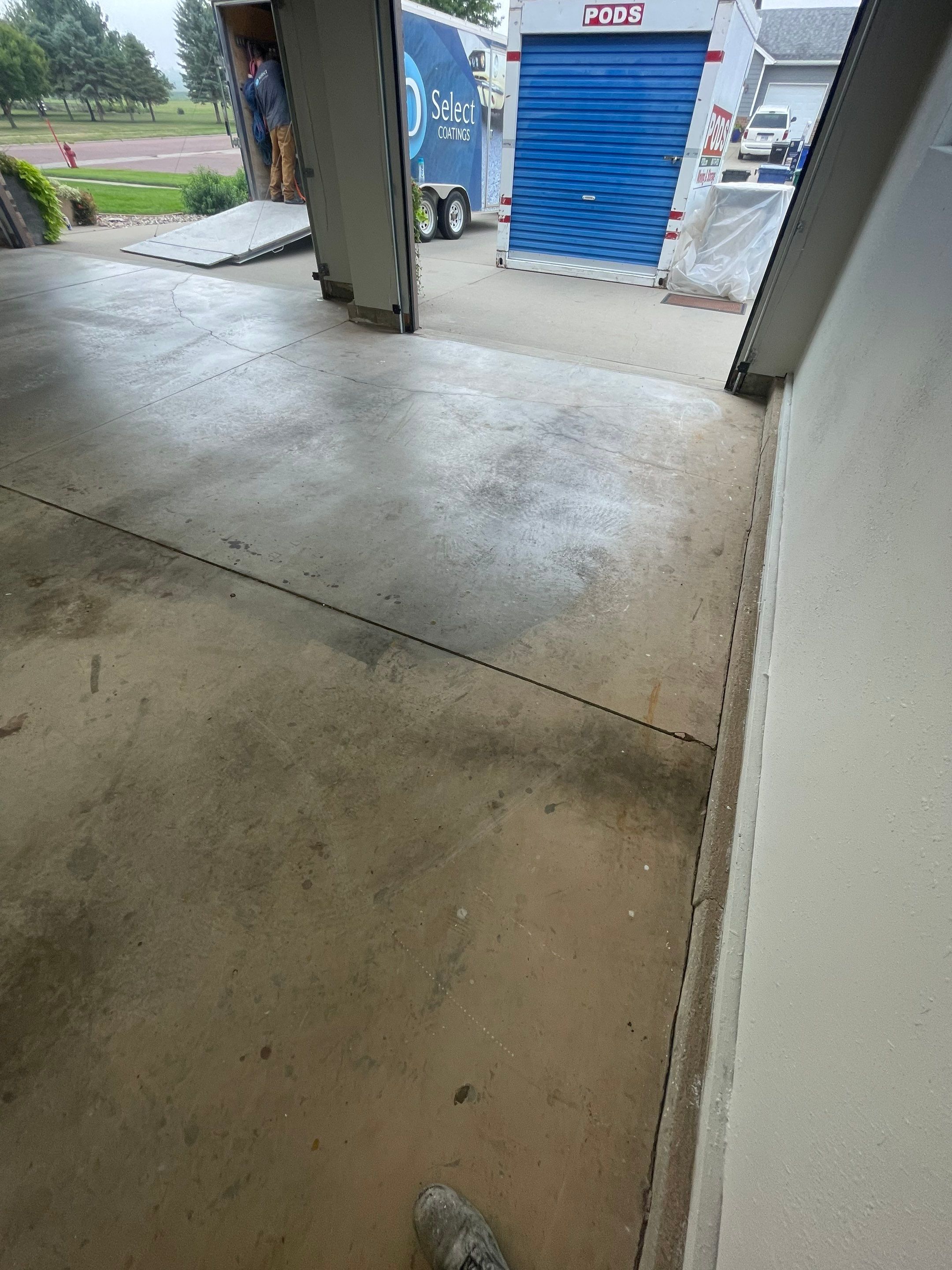 Multi-Car Garage Floor Coating and Crack Repair in Tea by Select Painting, Coatings & Garage Cabinets