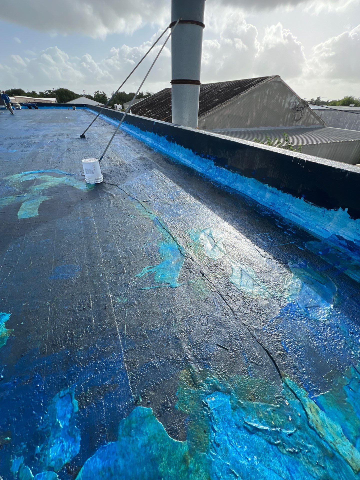 Dirty leaking Gravel Roof by Bayfront Roofing and Construction
