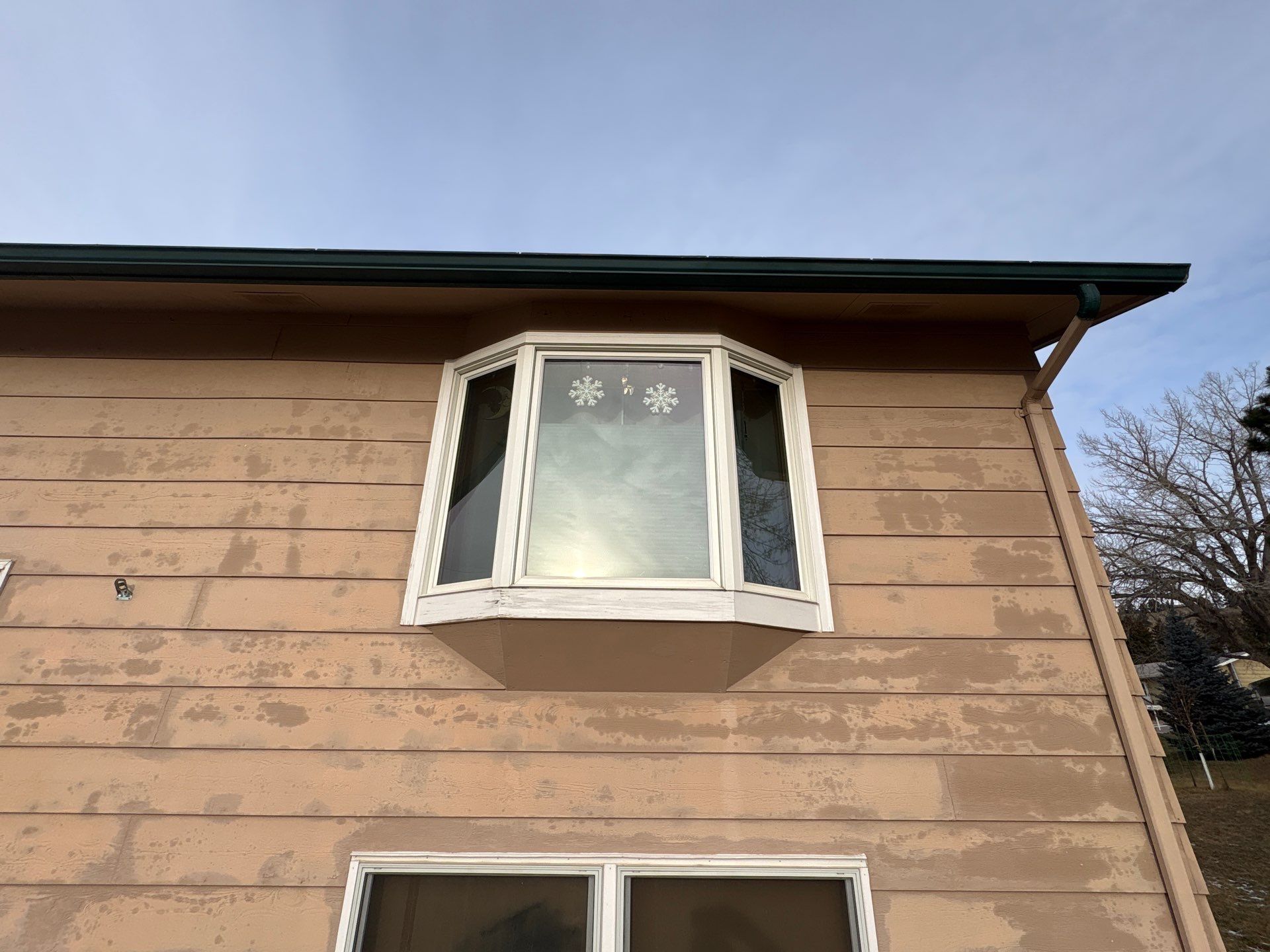 Black Hawk Home Showing its Age by Superior Siding Inc