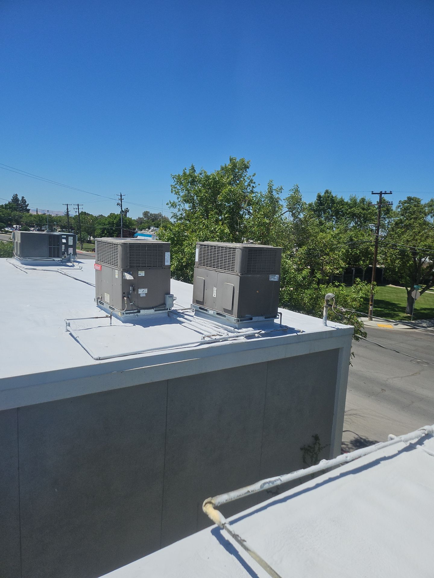 Foam Refurbish using General Coatings acrylic coatings and spray foam by Straight Edge Roofing Inc