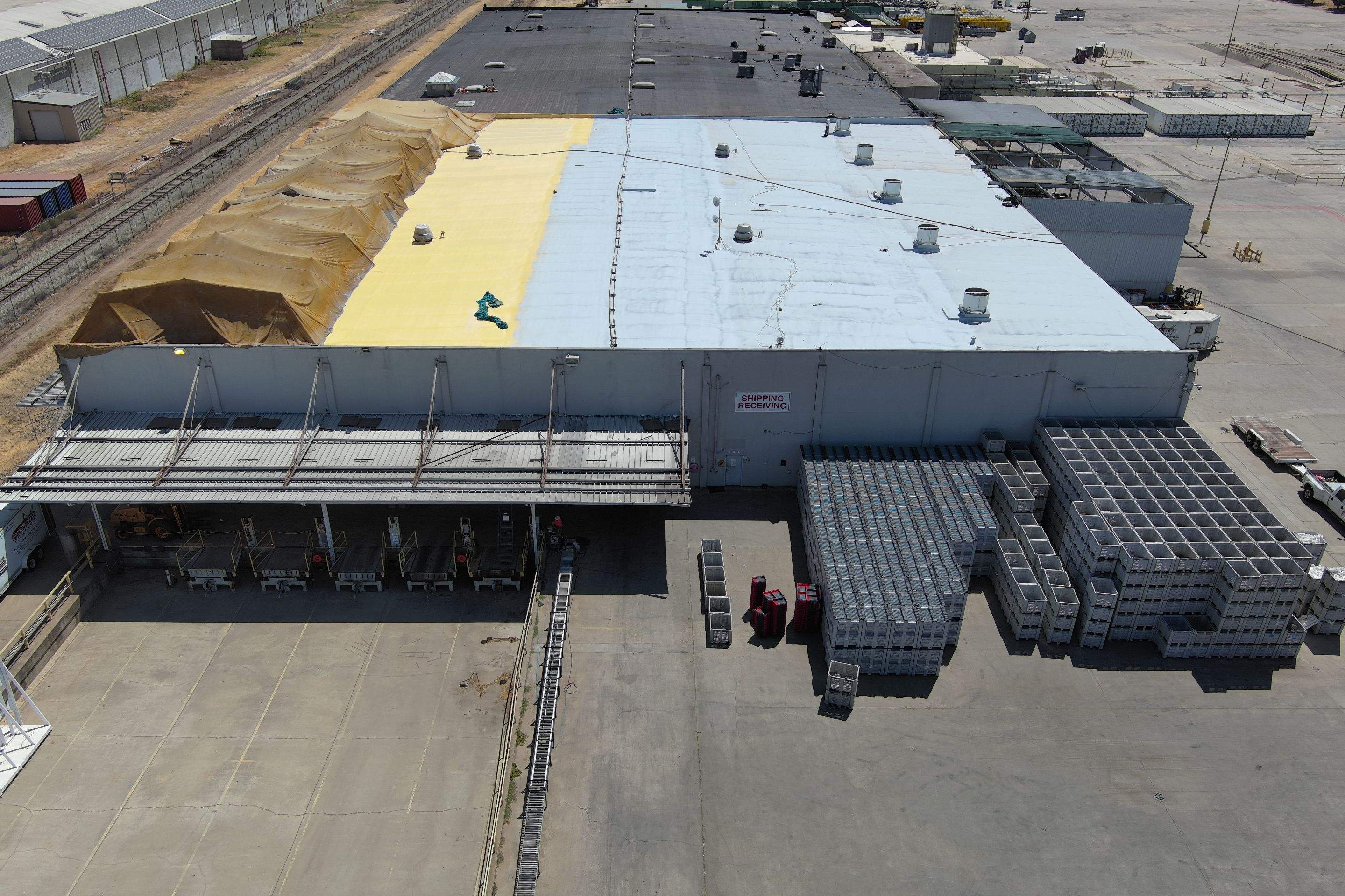 Pro Farms Spray foam roofing project by Straight Edge Roofing Inc