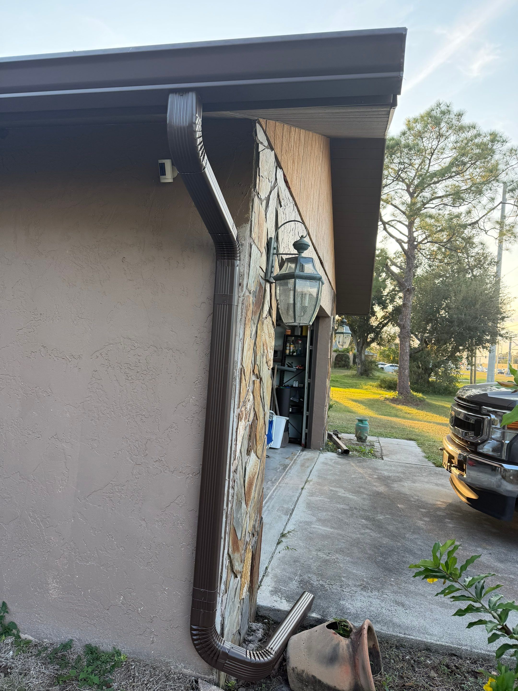 Brown Seamless Gutters for Beach Cottages in Sarasota FL by Gutter Professors