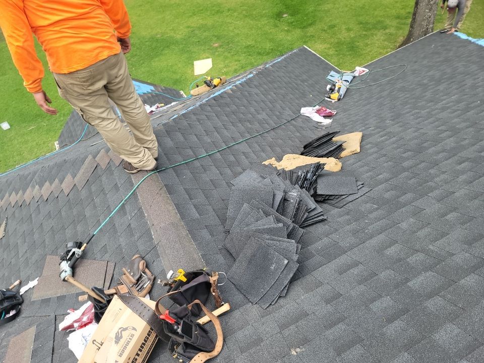 Residential Roofing Installation using Roof Replacement by American Roofing & Construction LLC