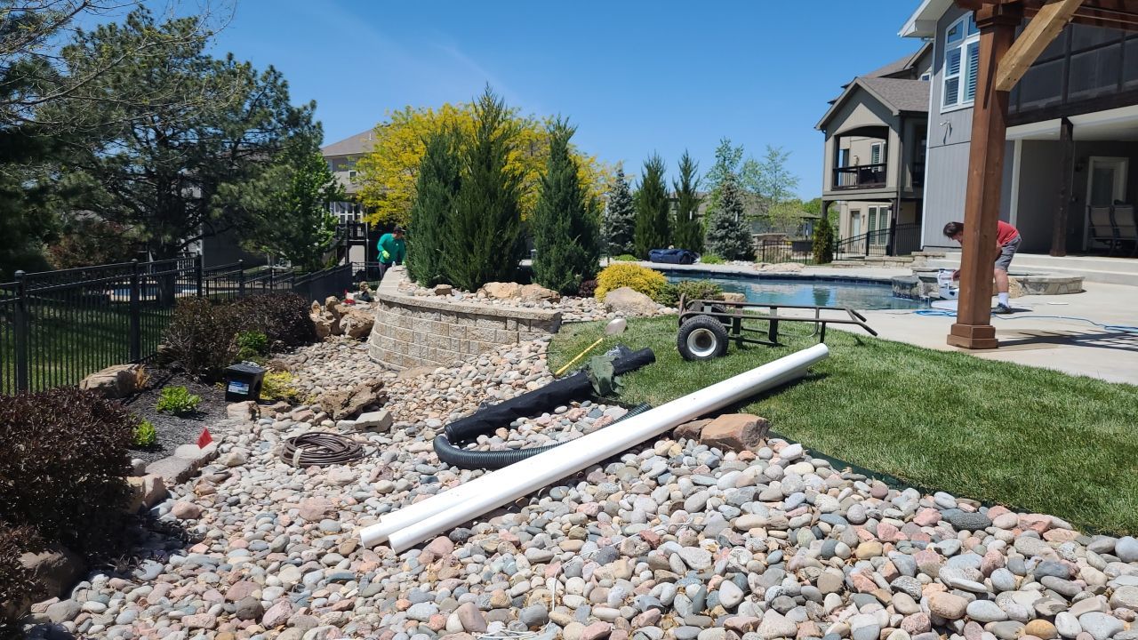 Pool Retaining Wall by LAND ESCAPES LLC